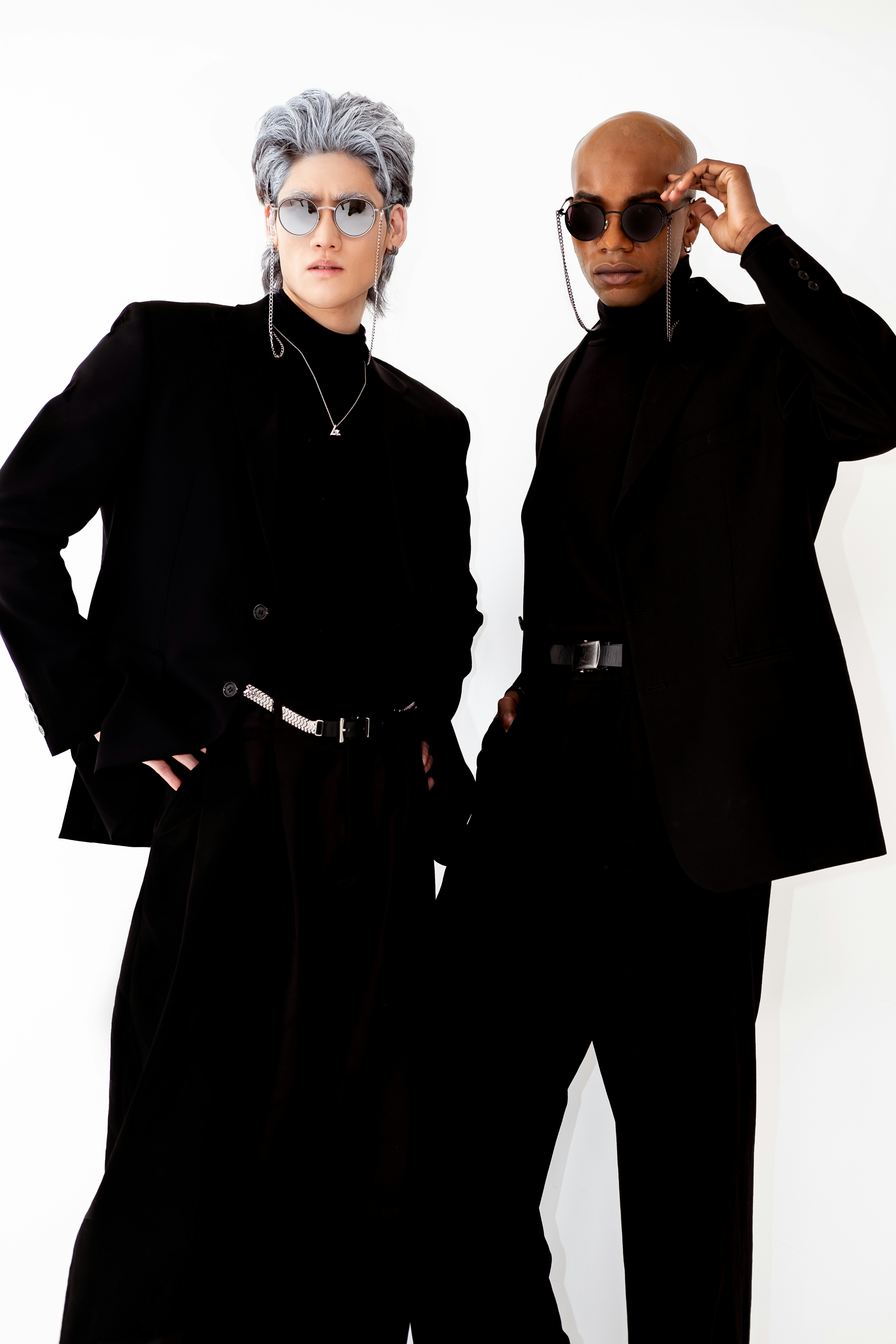 a couple of people standing next to each other