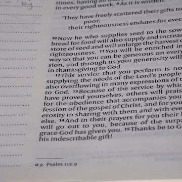 A close up of a book with writing on it