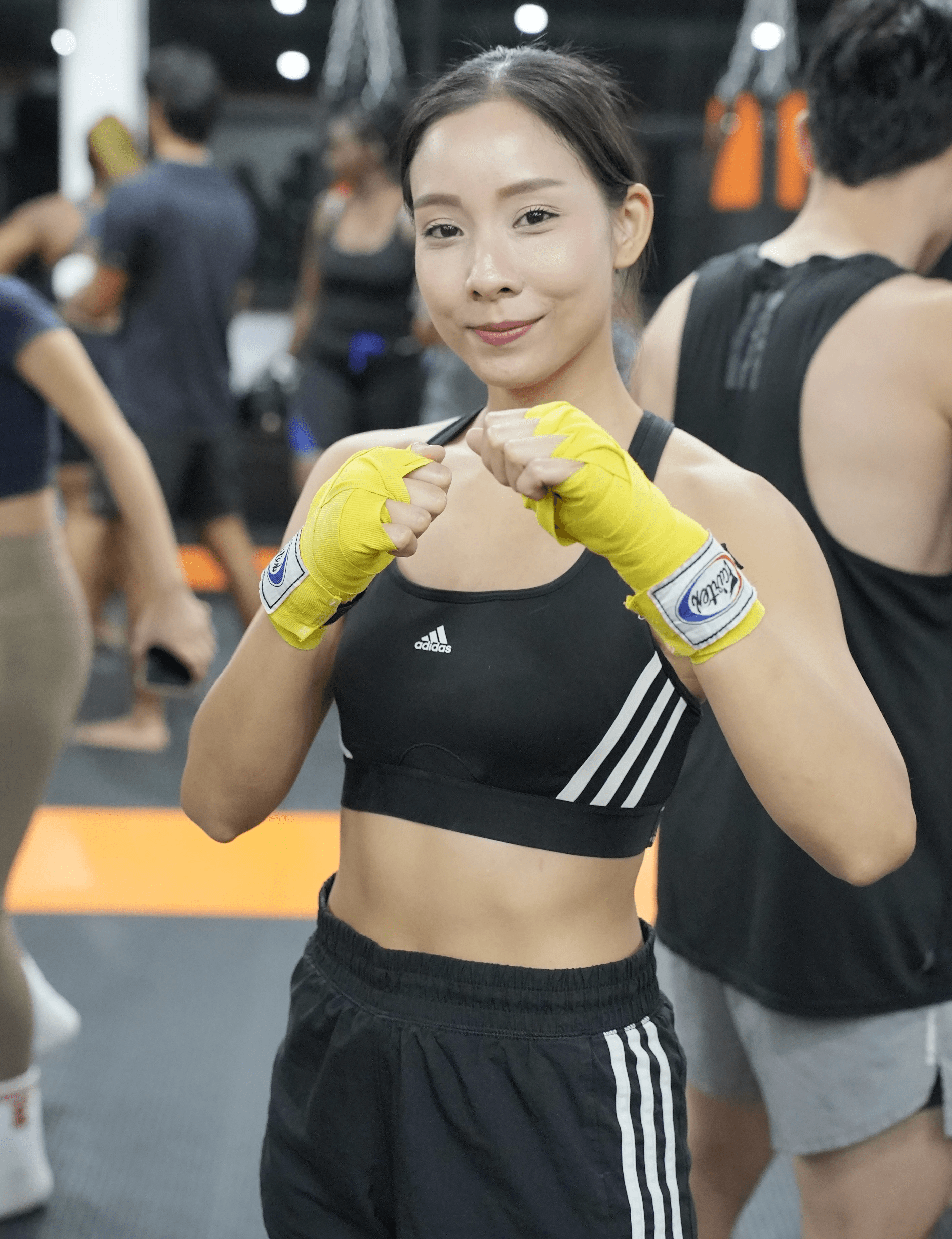 woman posing with wraps at INNOV8 MMA gym