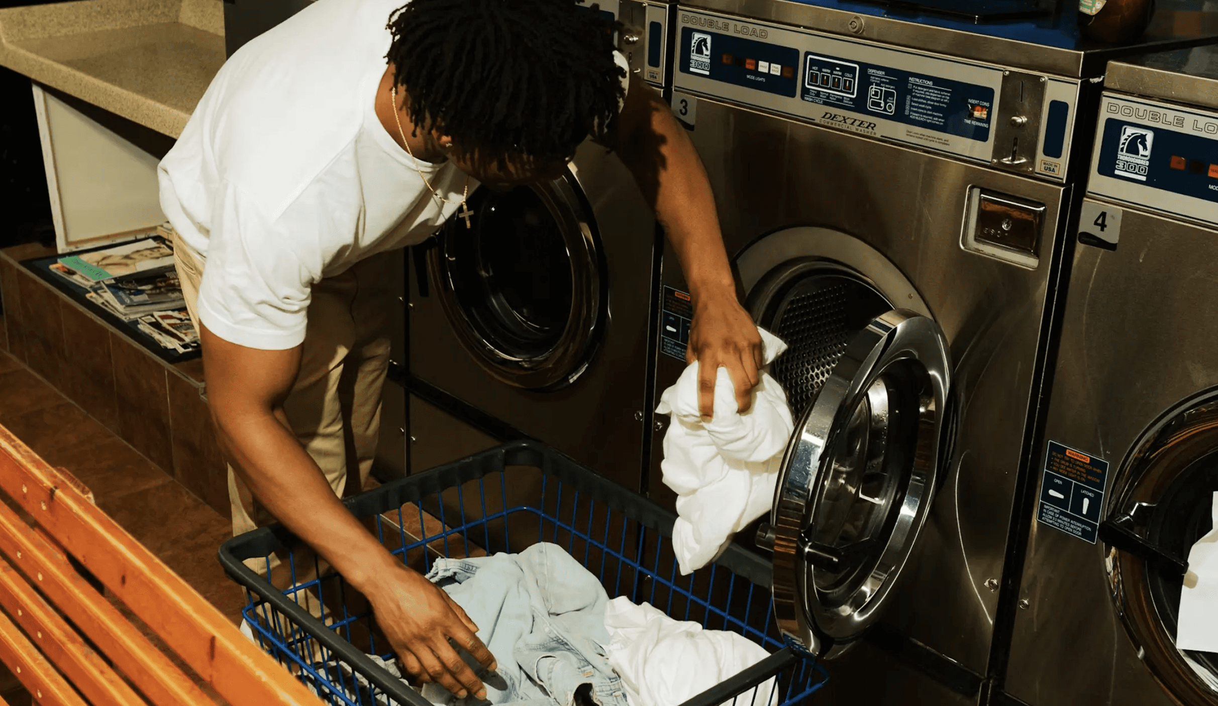White laundry hanging on an outdoor clothesline in the garden.