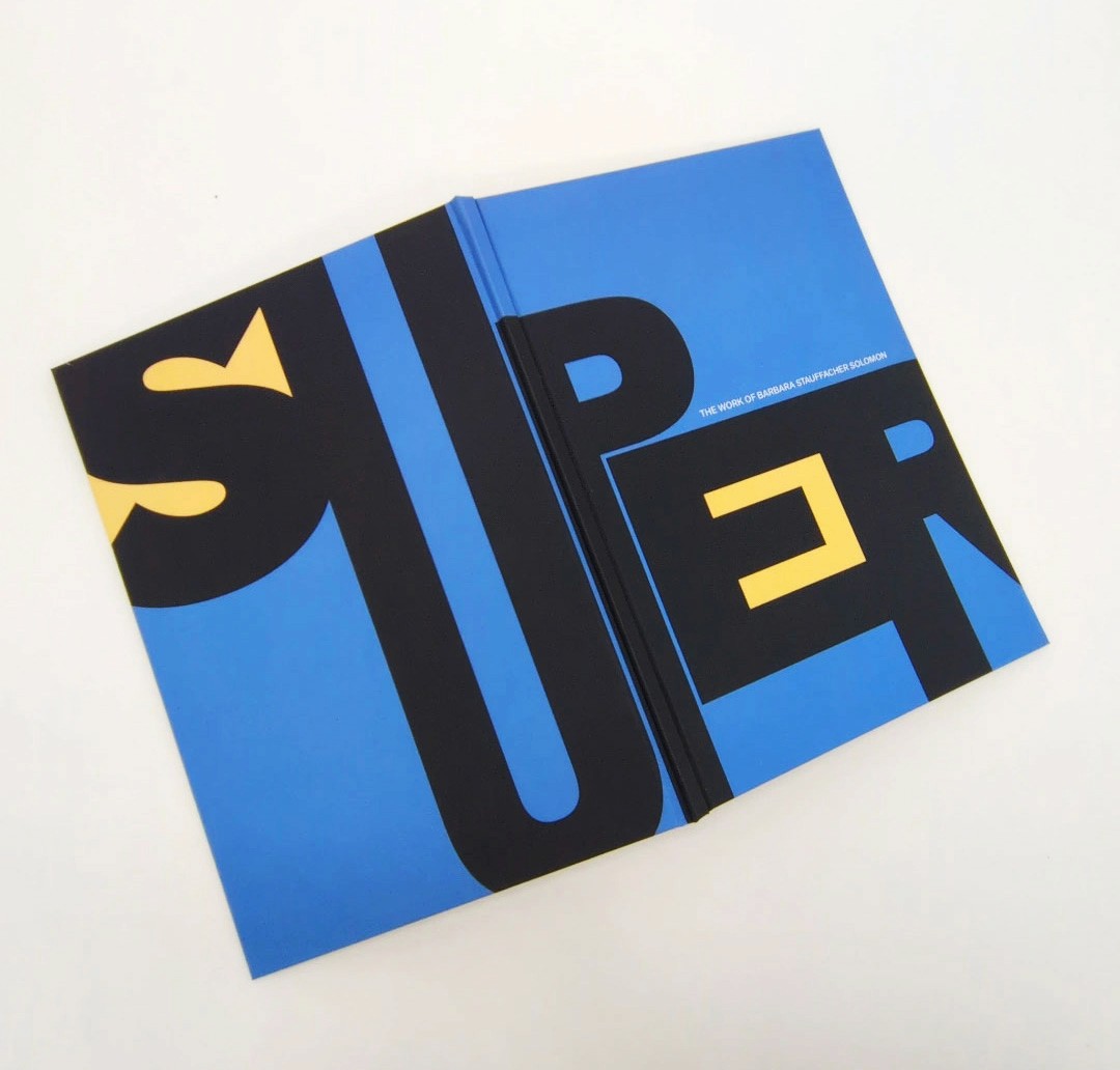 Modern sports supplement packaging tubes with bold typography and color-block design