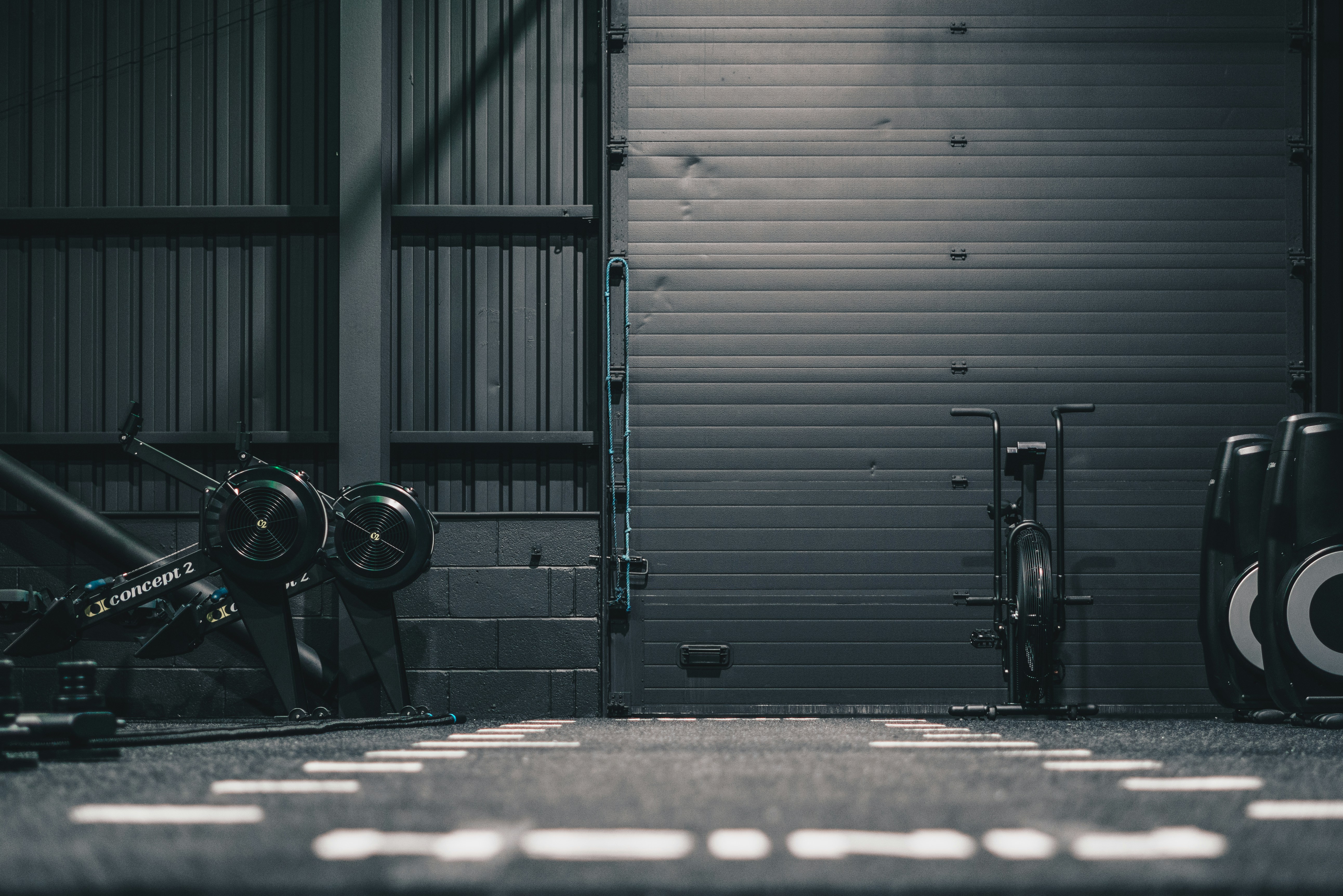 a bike parked in front of a garage door