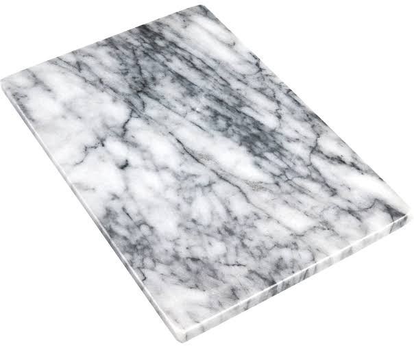Rectangular white marble serving board with natural grey veining