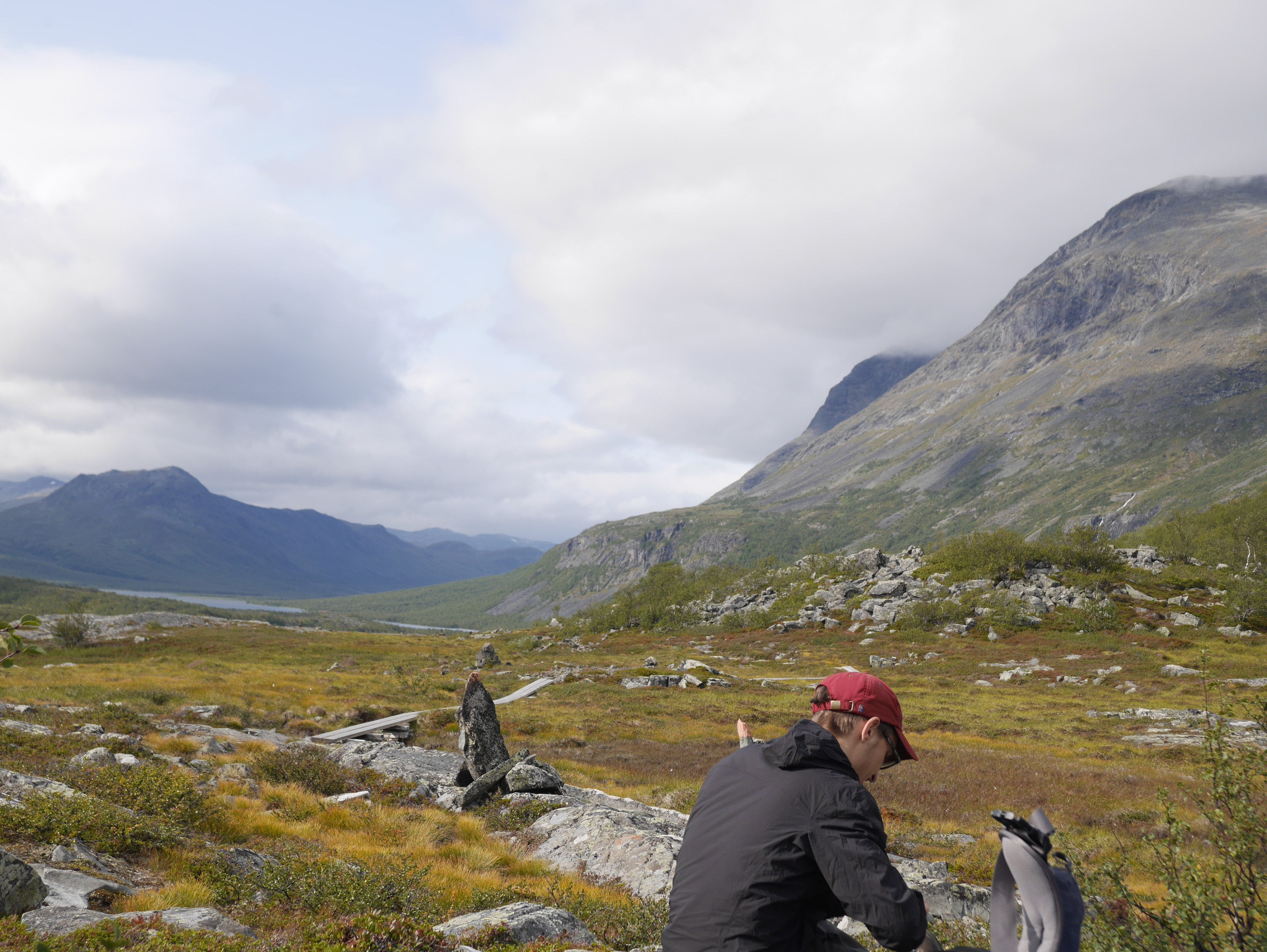 people sitting on chair in front of laptop computers