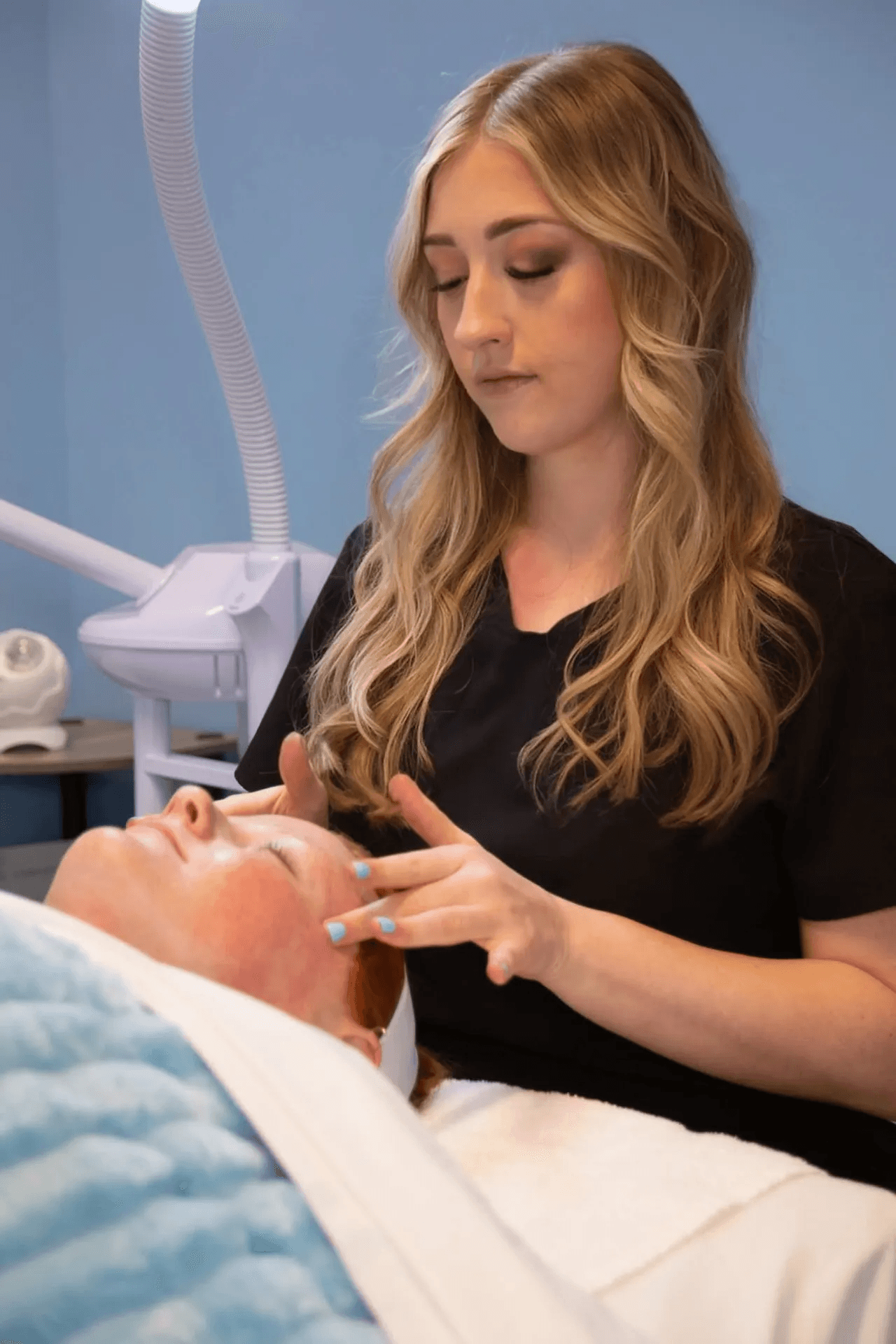 Experience ultimate relaxation with the Deluxe Revitalization Facial at Skinfinity & Beyond in Davidson, NC. This 60-minute treatment includes deep cleansing, enzyme exfoliation, extractions, custom serums, and your choice of two soothing massages (hand, scalp, foot, or shoulder). Ice globes reduce inflammation and tone the skin for a refreshed, radiant glow. Book now for a rejuvenating skincare experience! Deluxe revitalization facial