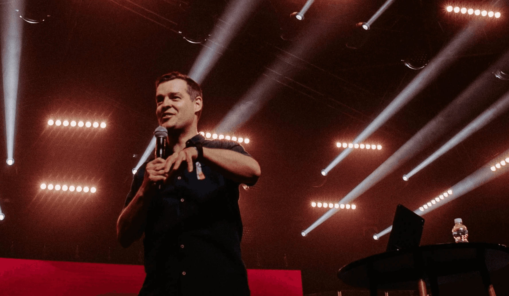 Smiling woman in feathered carnival costume