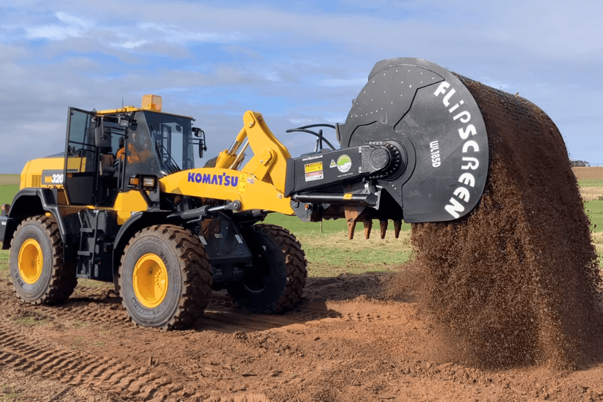 FlipScreen attachment on a Komatsu Loader
