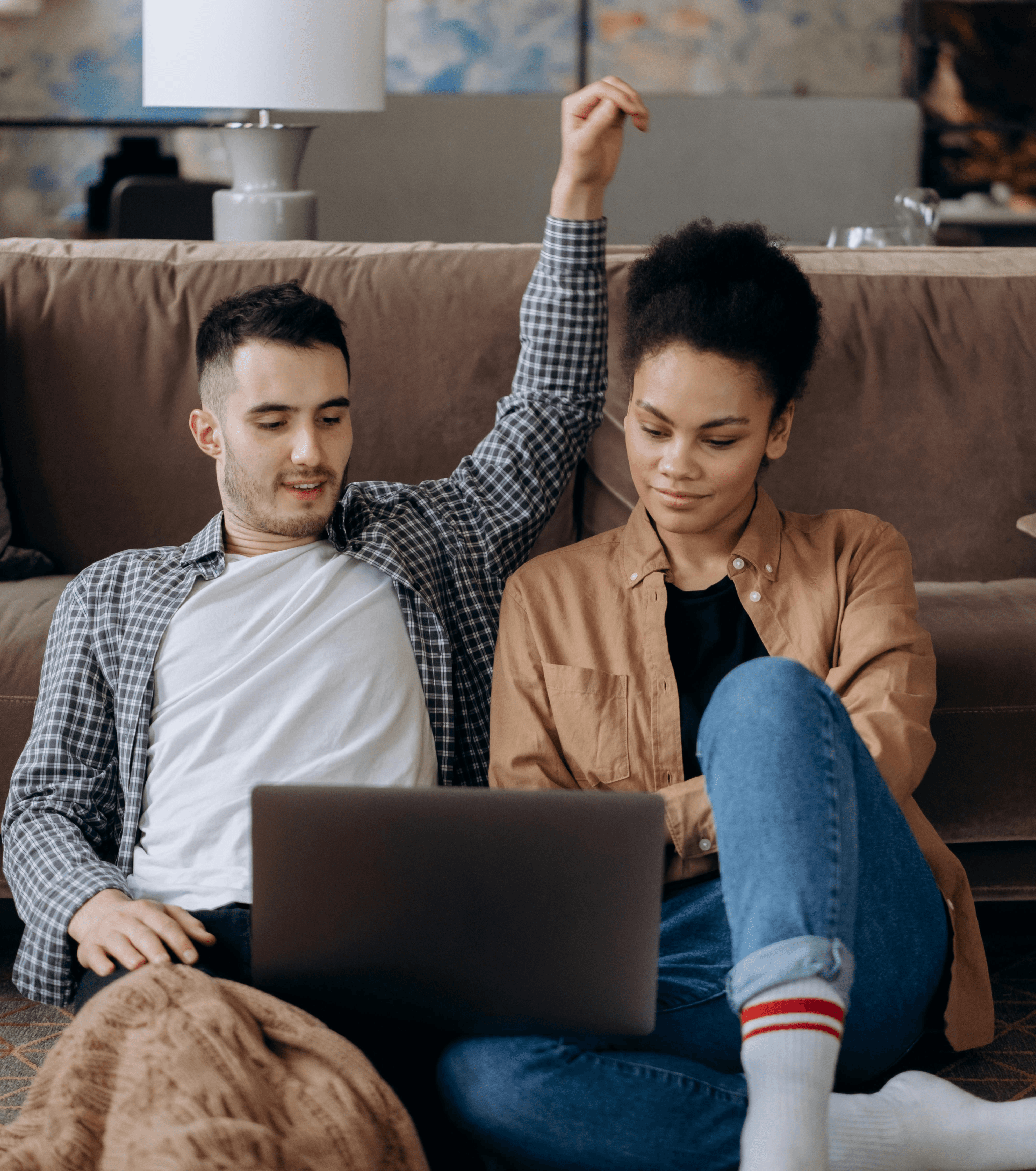 man and woman walking on the street during daytime