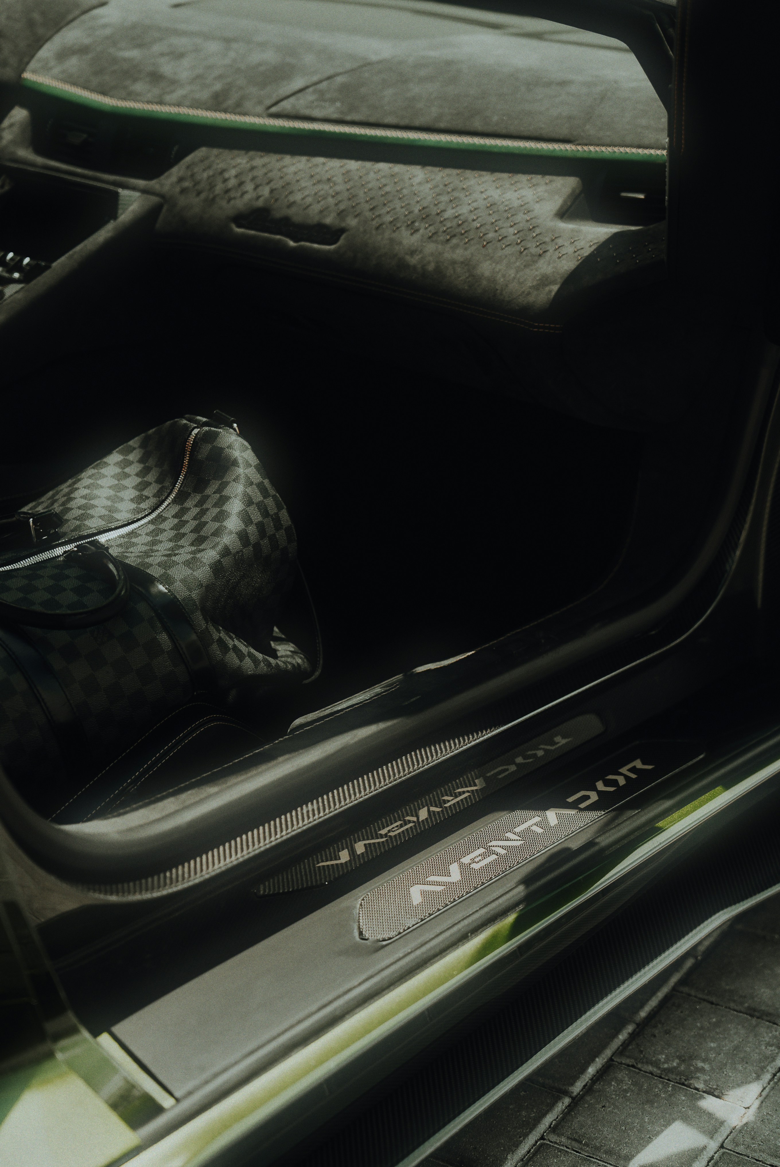 a close up of a car dashboard with the word ghost written on it