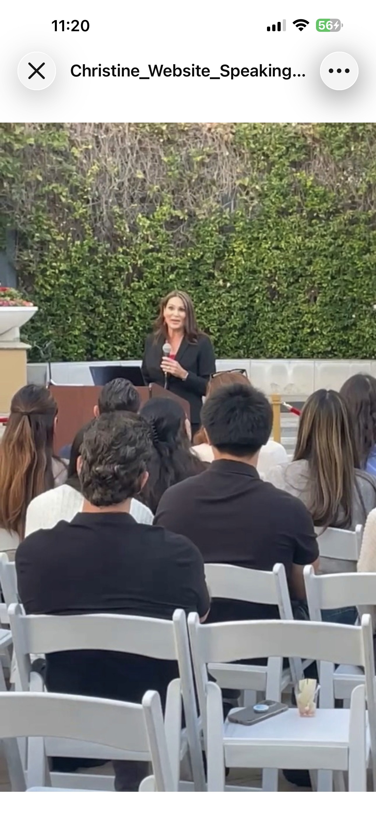 Christine Perkins speaking to an audience