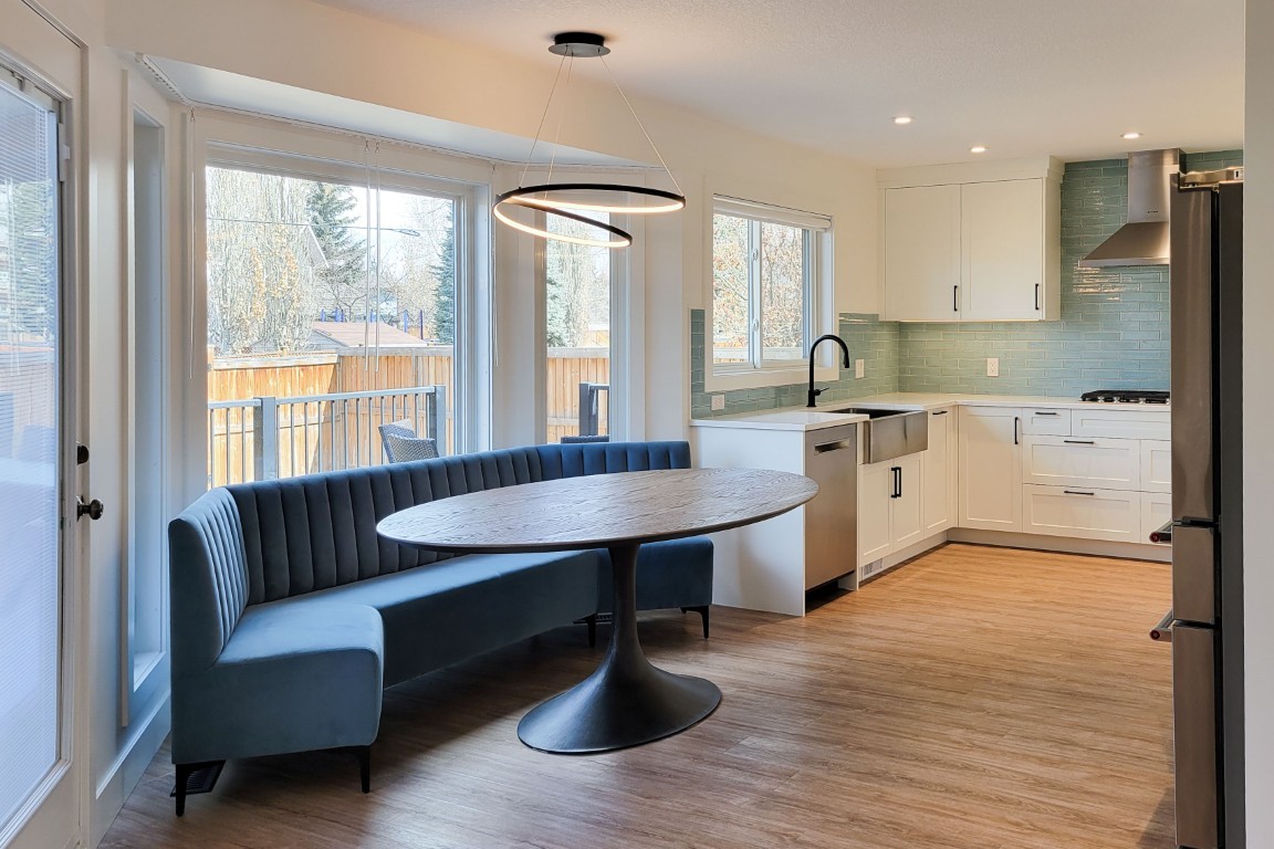 Image of Modern kitchen with dining area by KHD Homes featuring interior design, layout design, and home renovations.