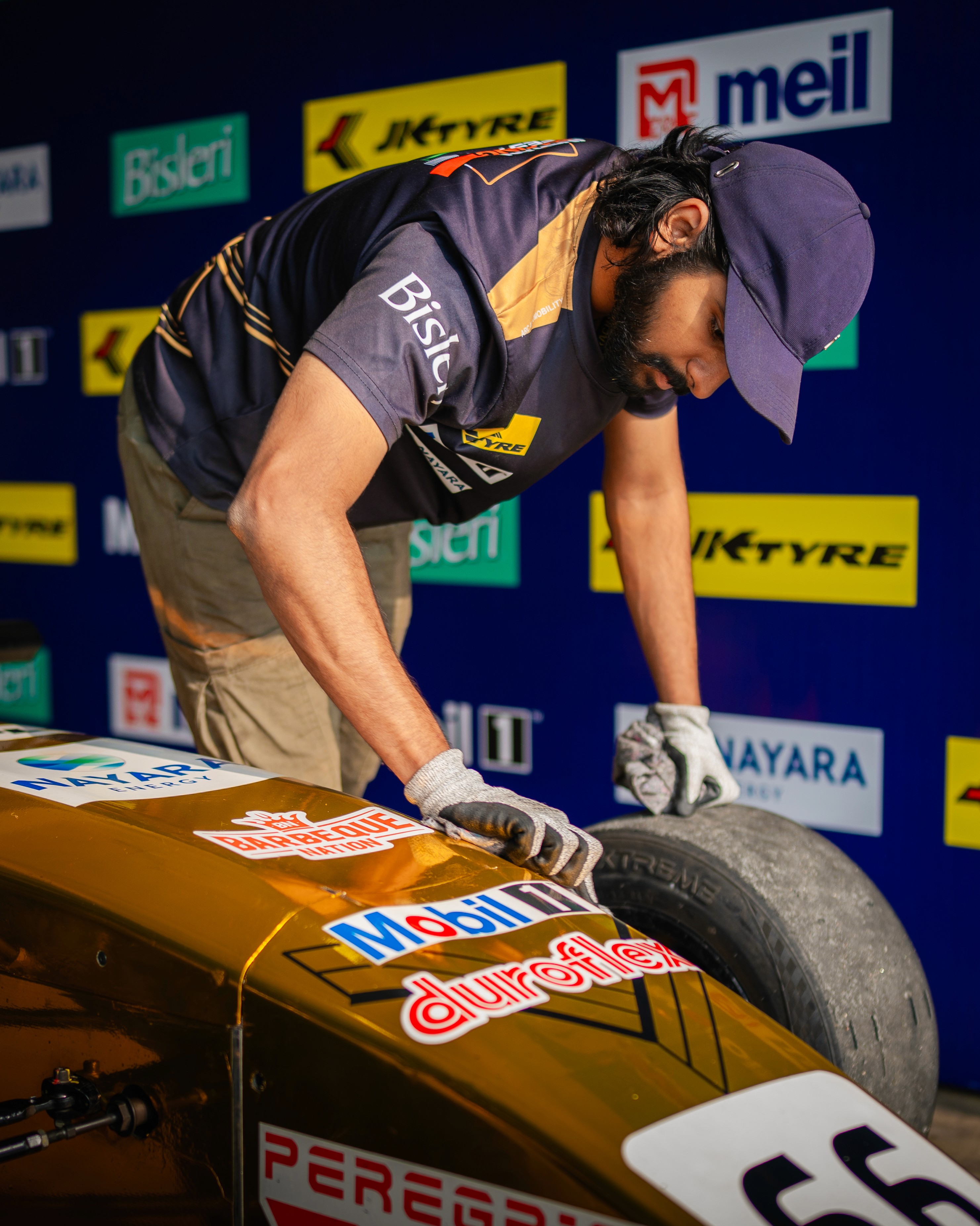 Surfer cleaning Surf board