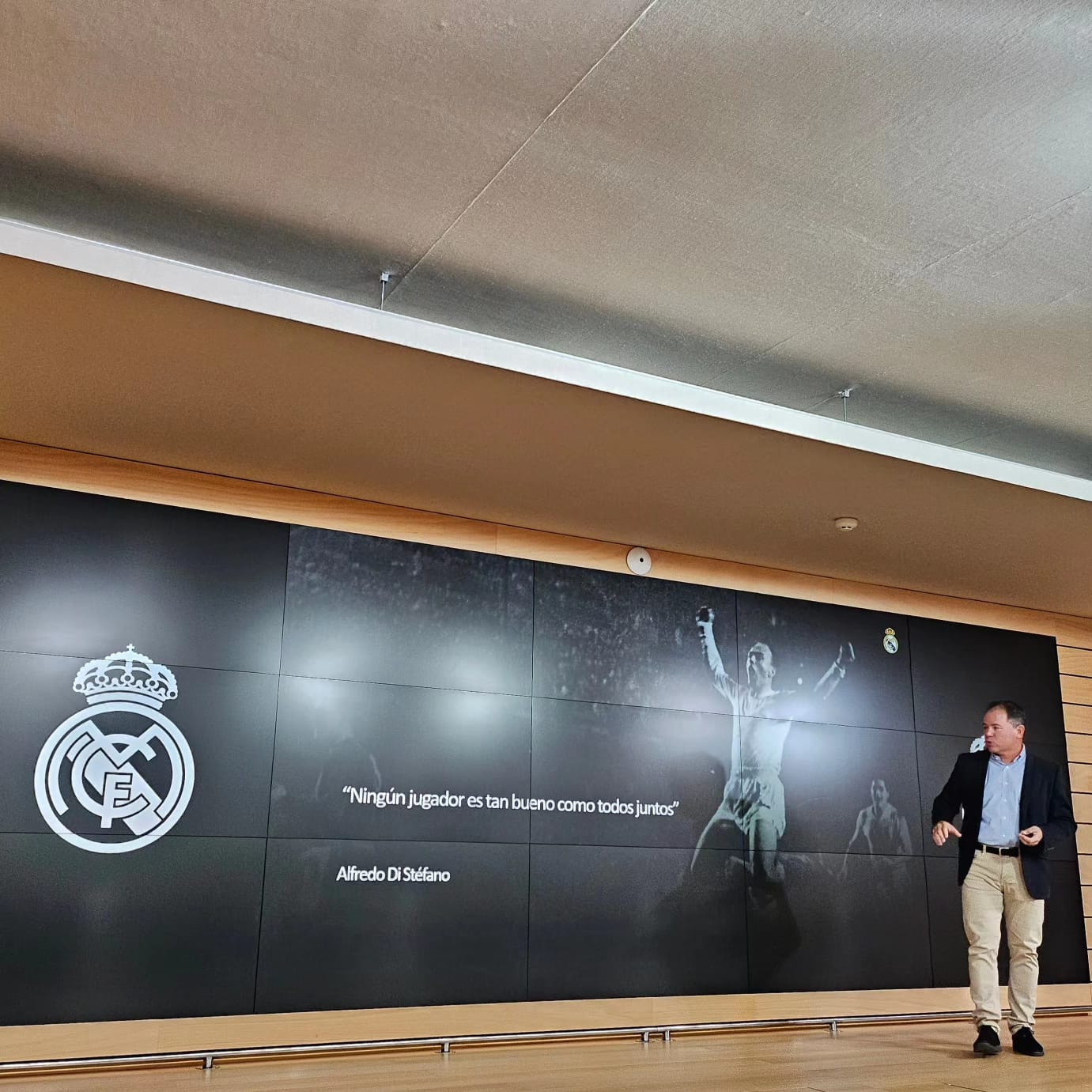 Woman in real madrid jersey and ripped jeans