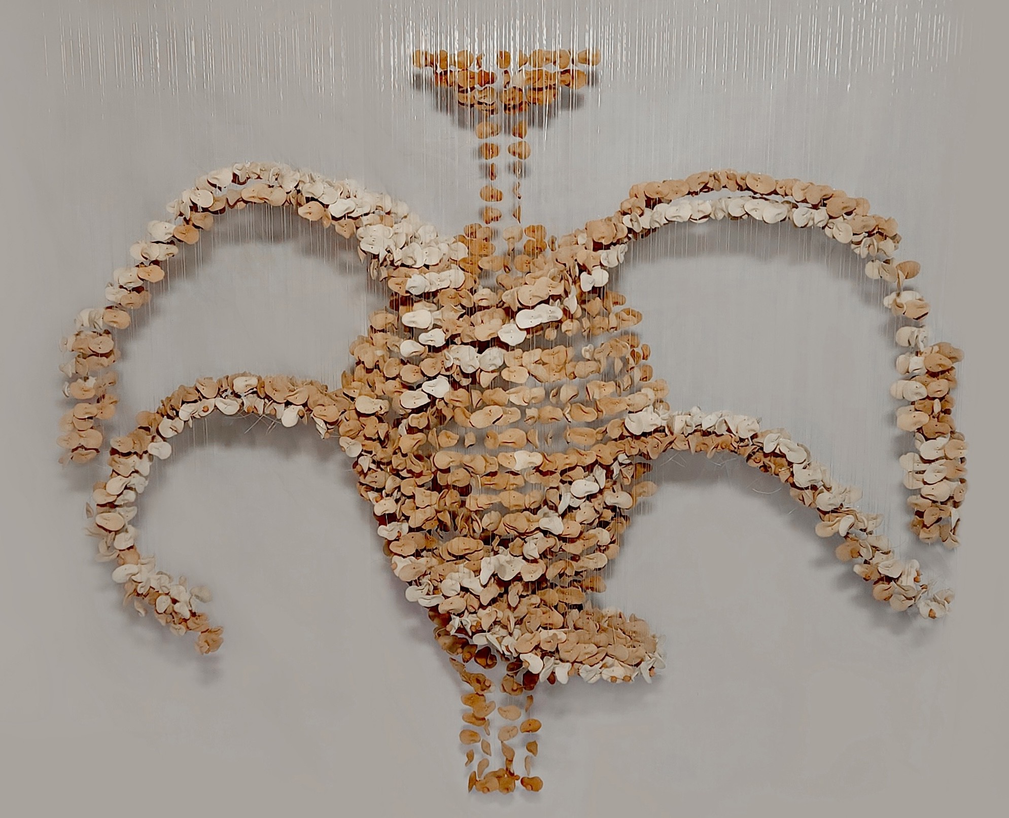 Ngozi-Omeje Ezema, Aga ekworo ngbagbu, 2026, Ceramics, acrylic, monofilament, fishing line, metal, 150 x 30 x 150 cm | 59 x 11.8 x 59 in. Courtey the artist and kó.