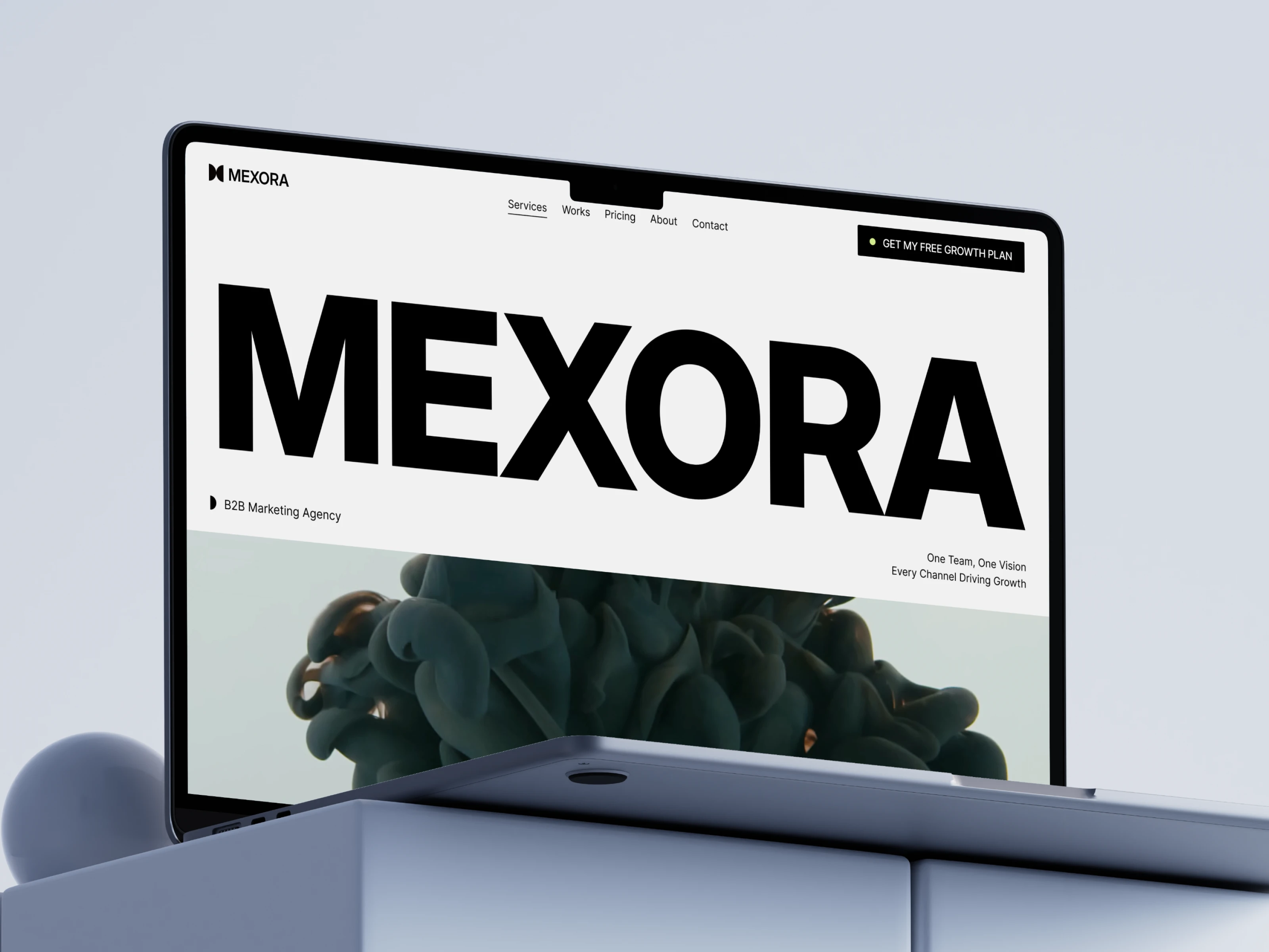 Mexora marketing agency website mockup on laptop with bold typography and dark fluid visuals