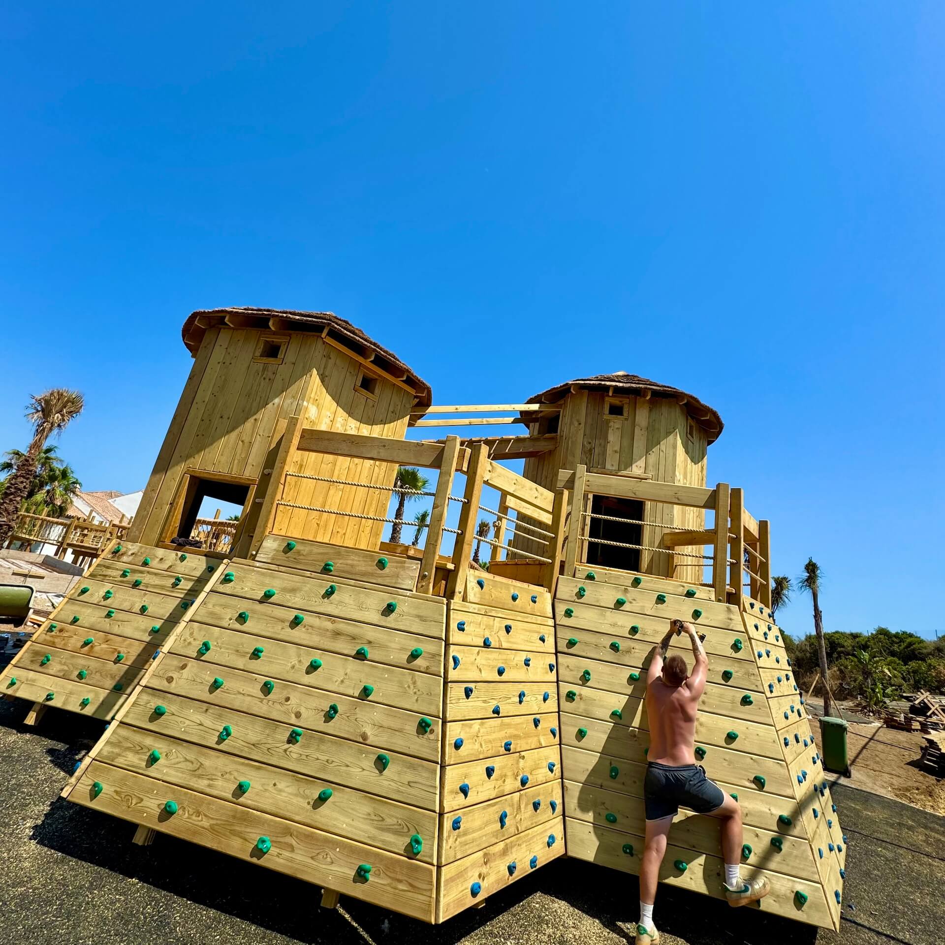 Streetside billboard with flyposters of the Batch.Works brand and illustrations