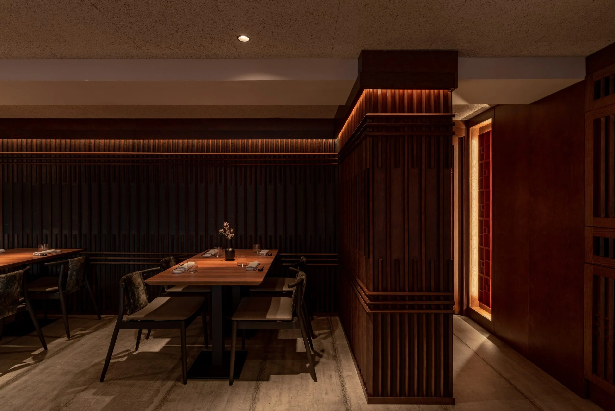 Golden cross atop a domed building with blue sky.