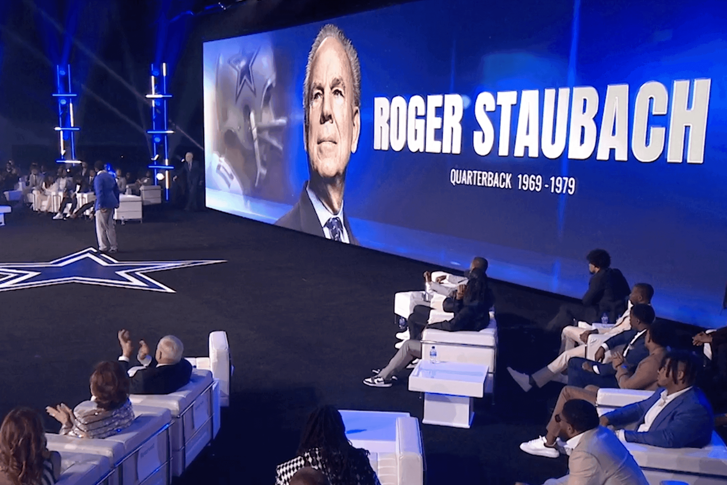 Roger Staubach being introduced onstage