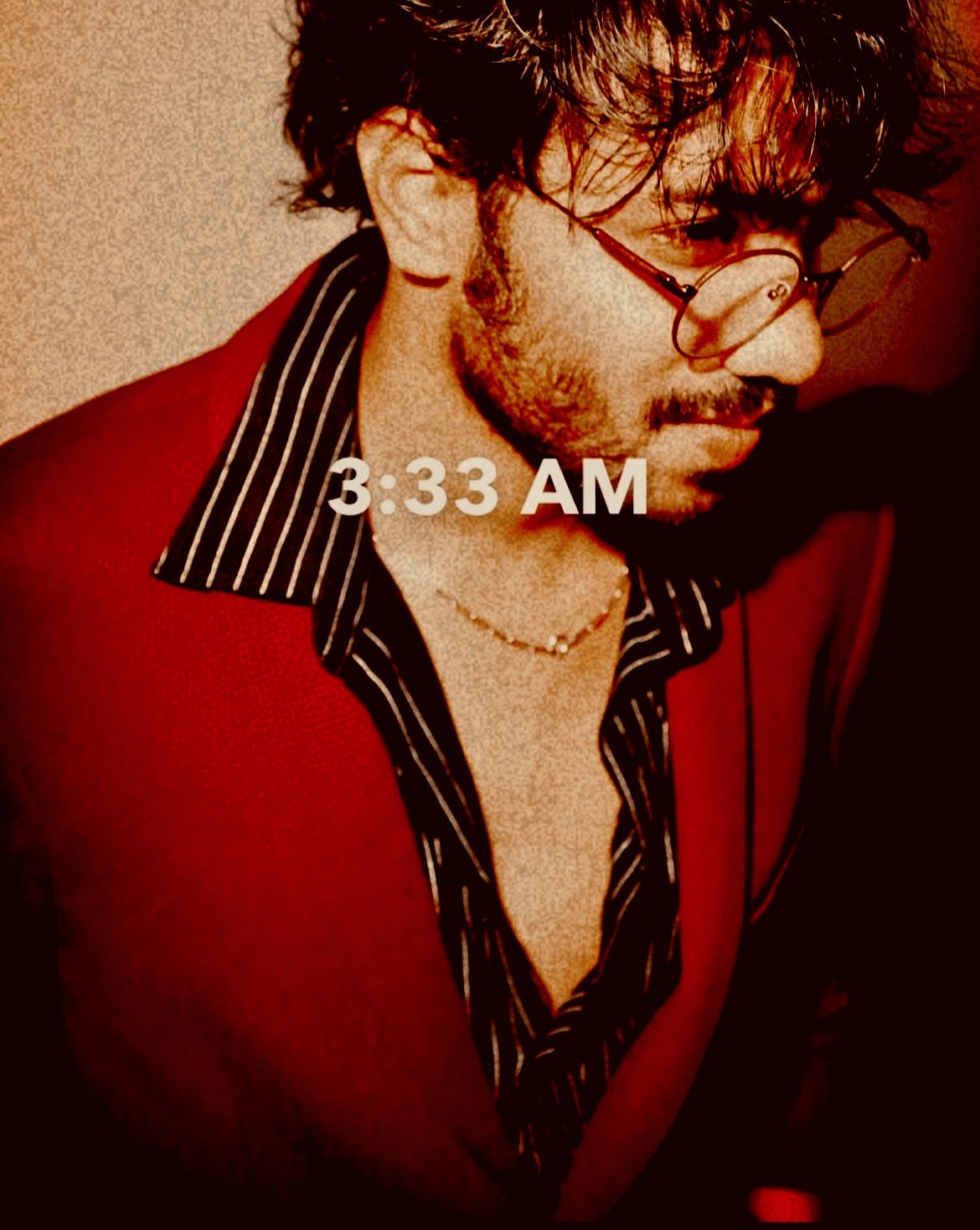 Creative portrait with geometric pink eyewear and bold fashion styling in urban setting