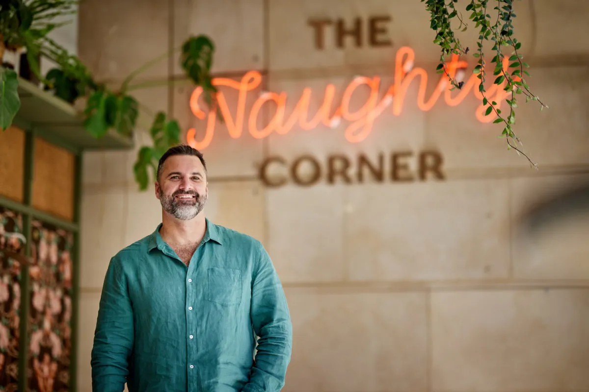 man in black hoodie standing