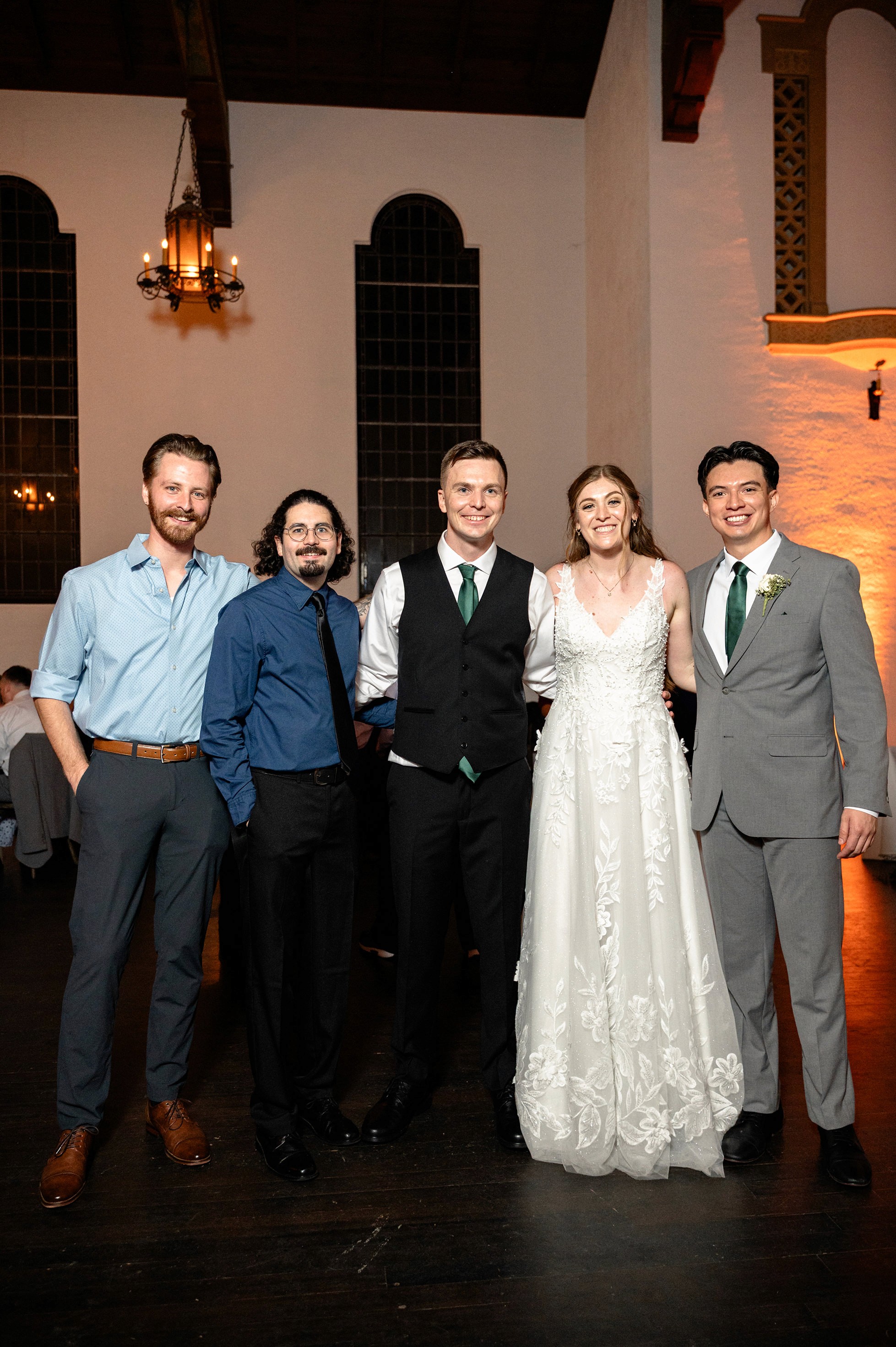 Flat lay wedding details with bouquet, rings, and sparkling bridal heels