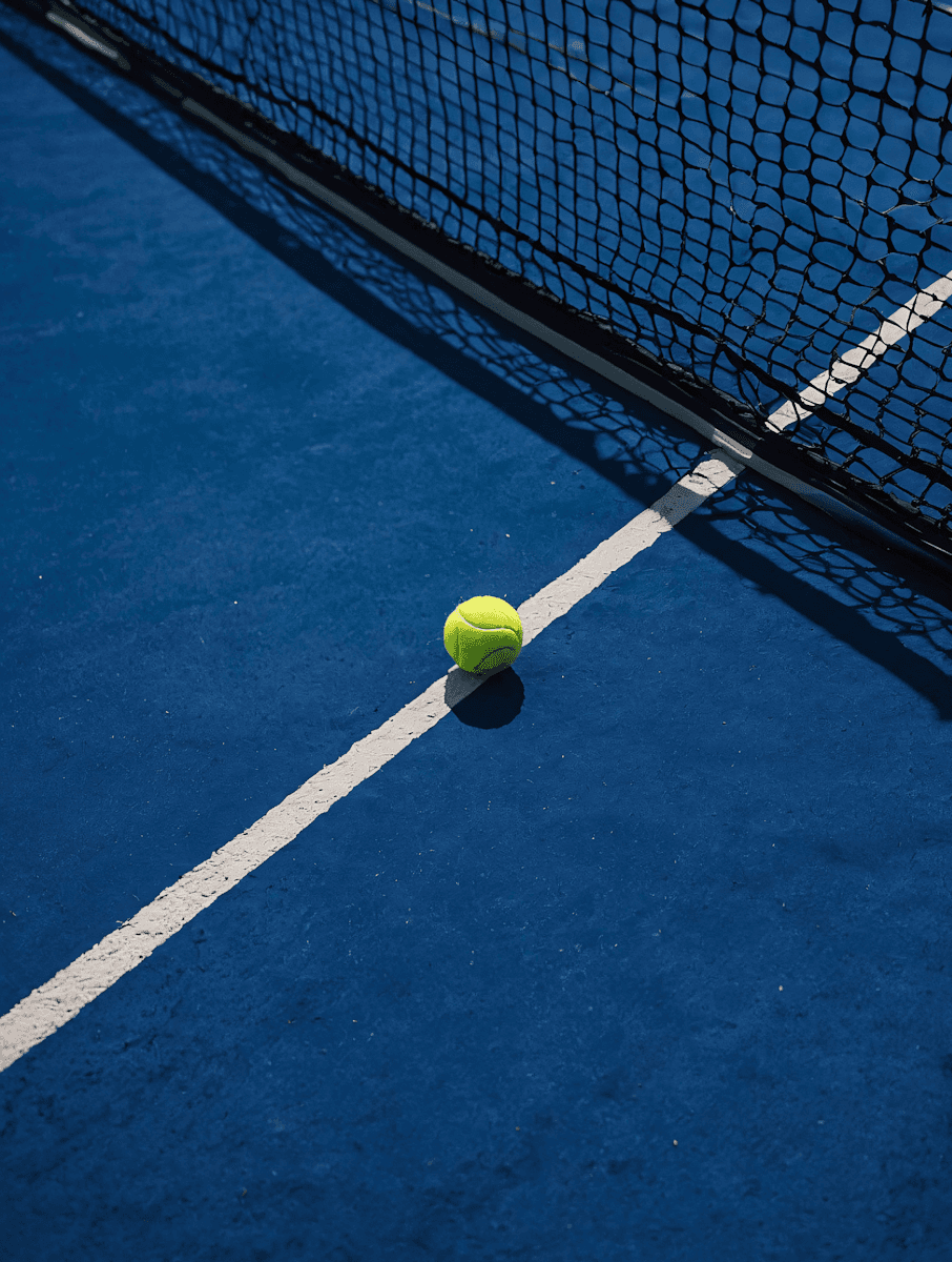 Tennis ball on the ground