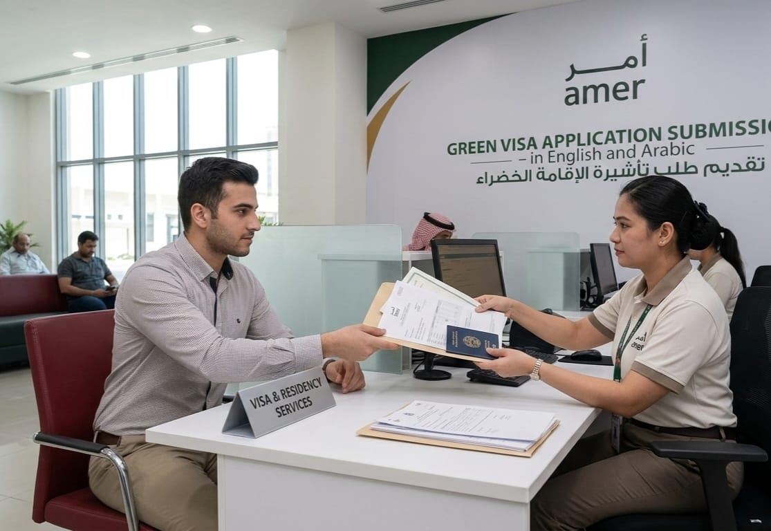A man submits his documents at the Amer Service Center in Dubai.
