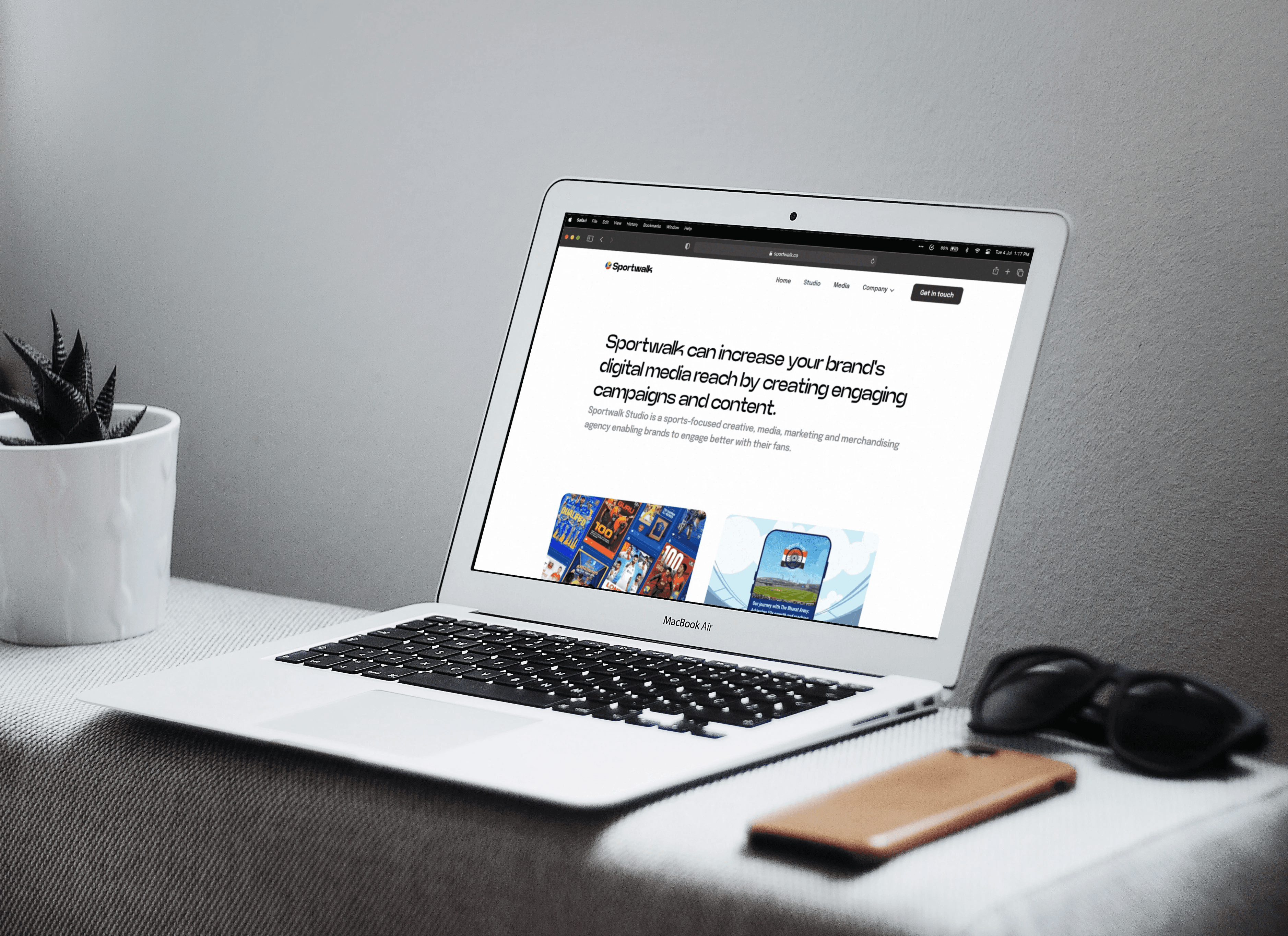 Laptop displaying a webpage introducing Sportwalk's branding engagement features.