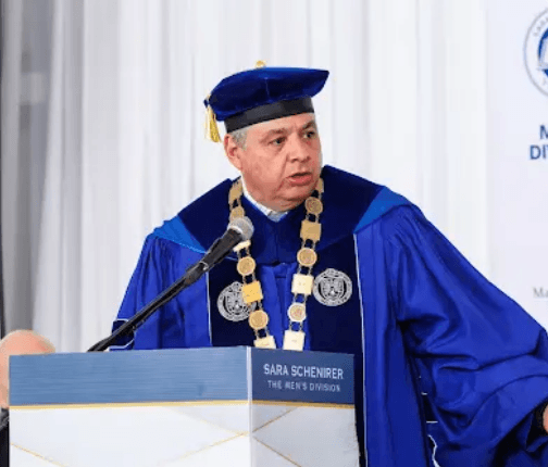 people throwing hats on air