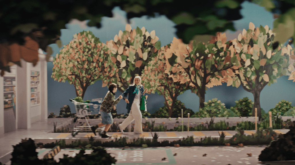 Person shown from behind biking in a forest.