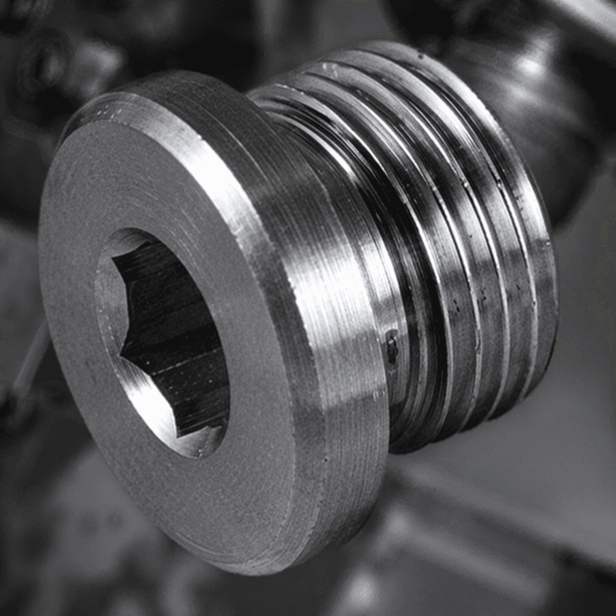 a close up of a screw on a blue background