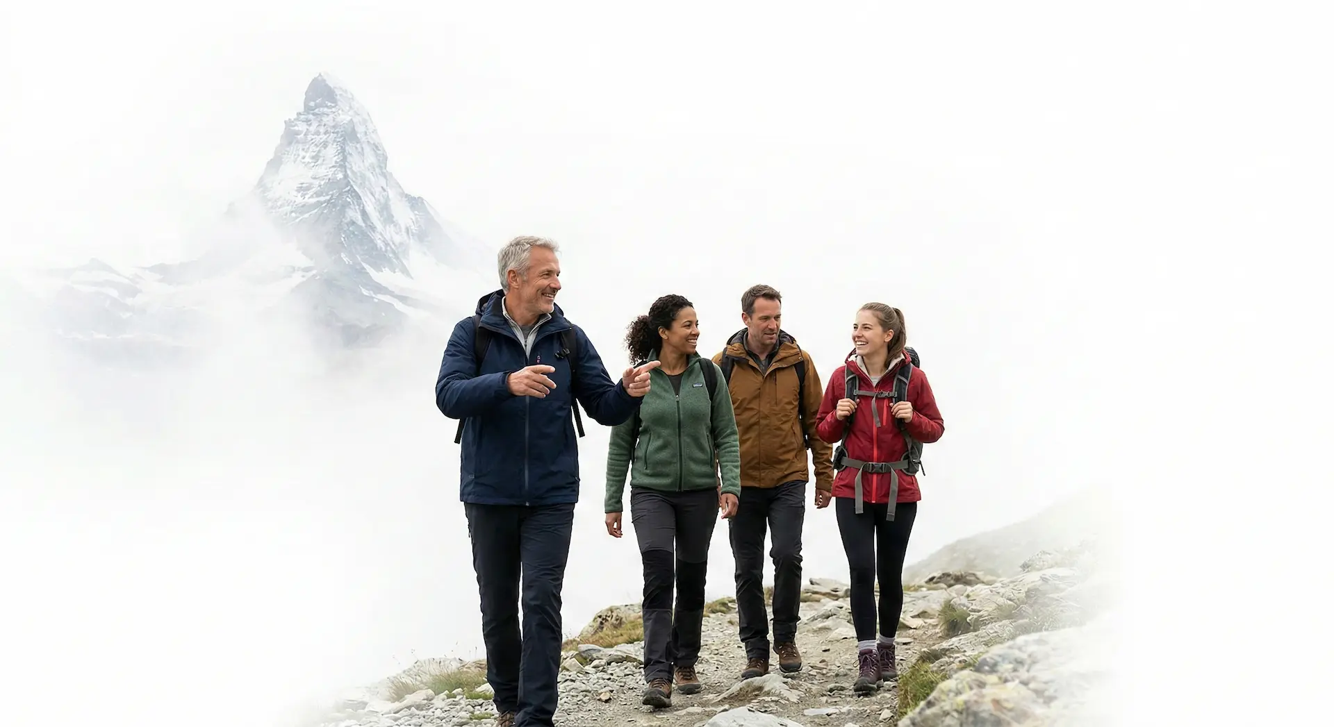 people hiking with the matterhorn behind in a team
