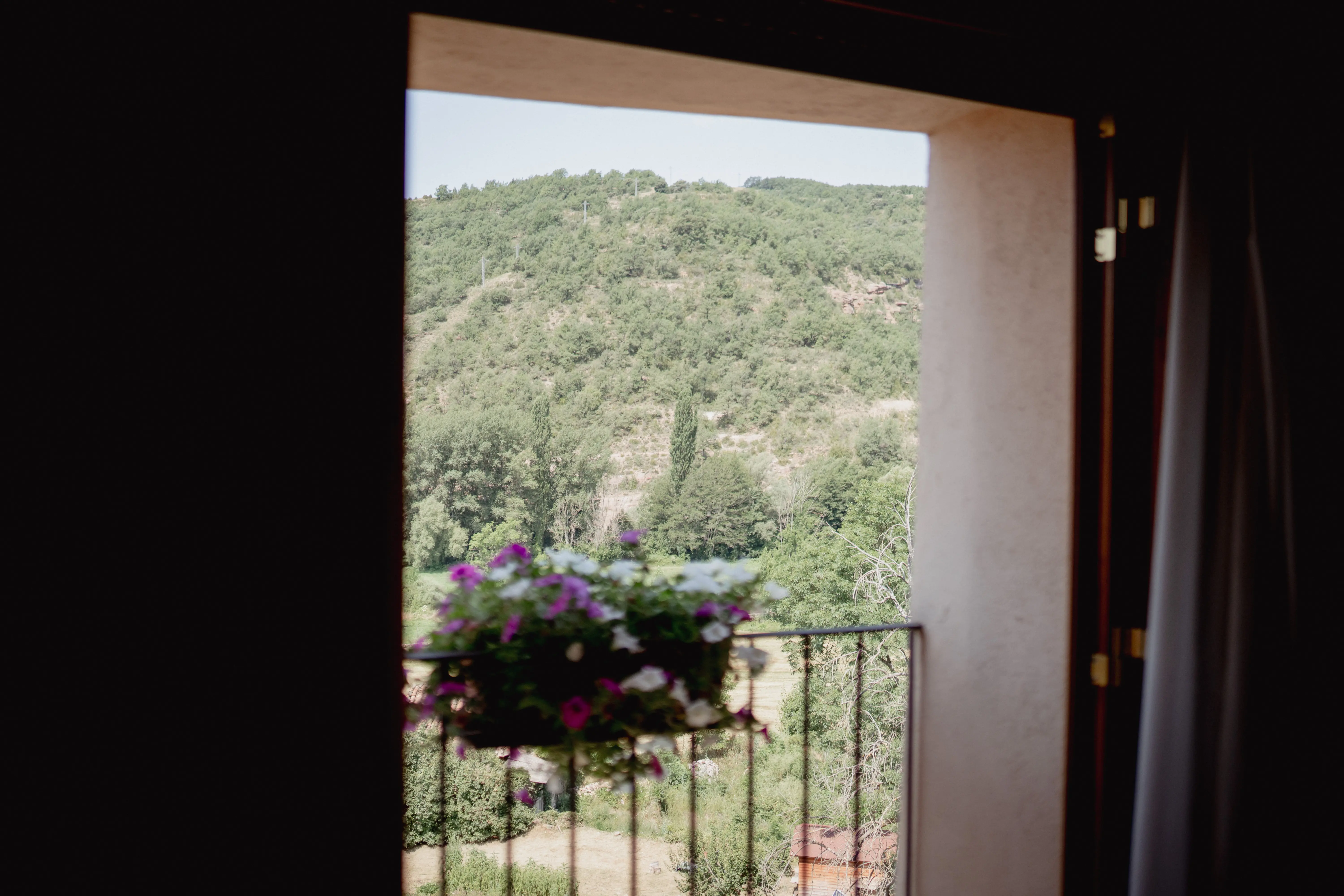 minimalistic hallway with partial view of the bathroom