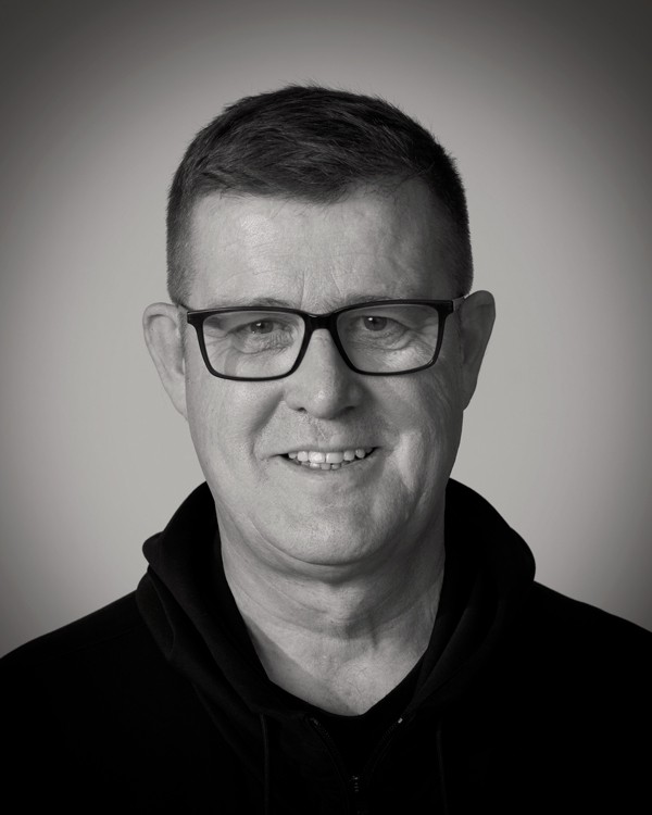 headshot of female in bright background
