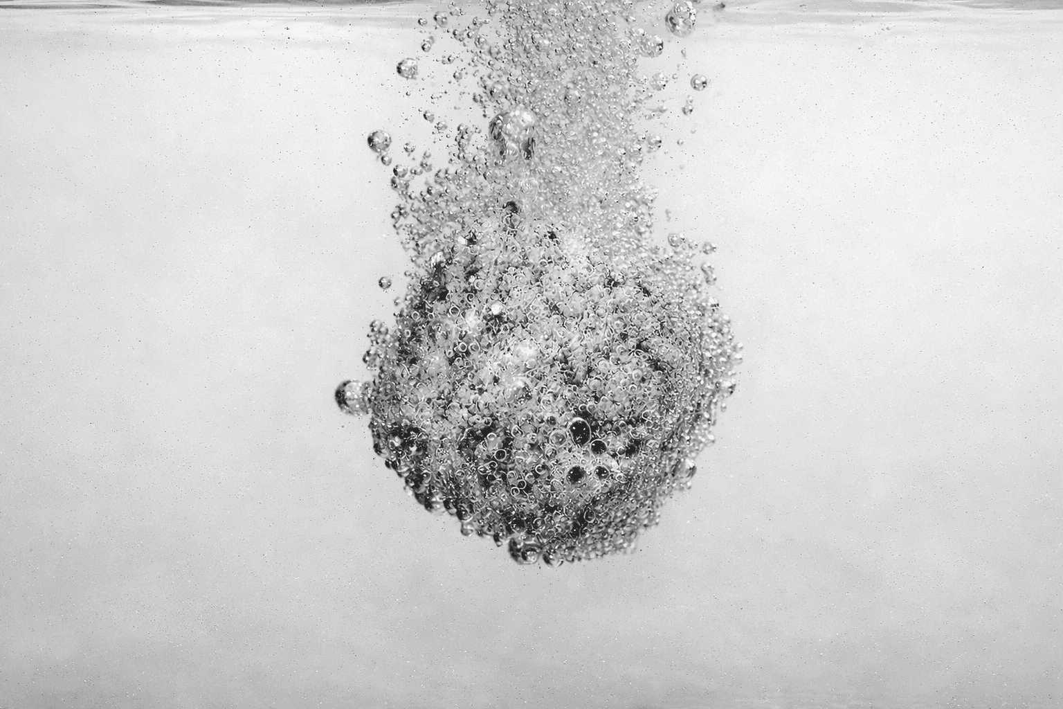 effervescent cube dissolving in water