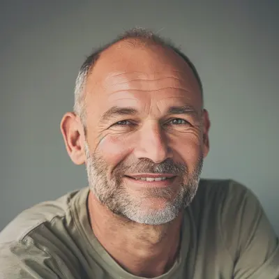 Mature man with beard, soft smile, natural light, landscaping client testimonial portrait