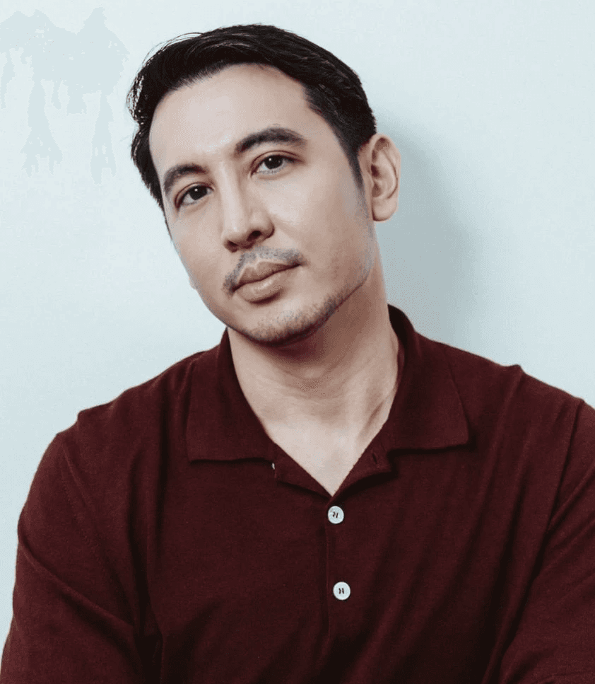 Cheerful Man in Brown Shirt