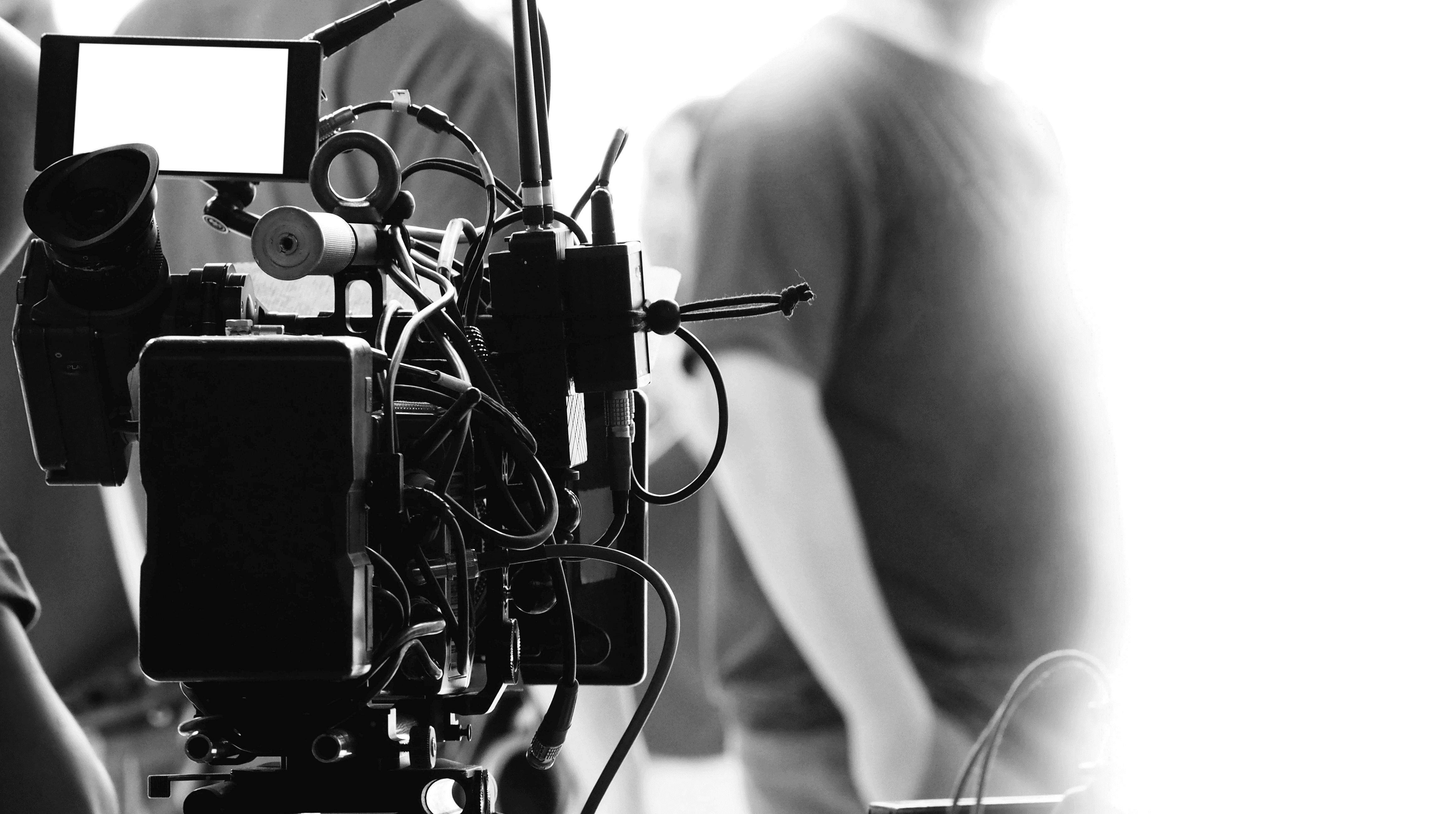 person using macbook pro on table