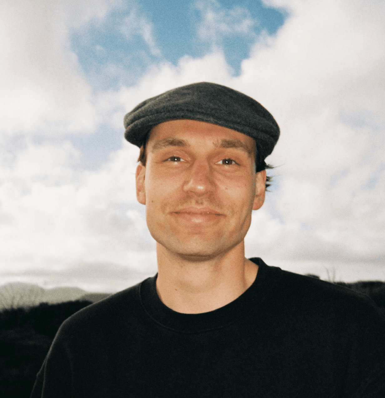 woman in white crew neck shirt smiling