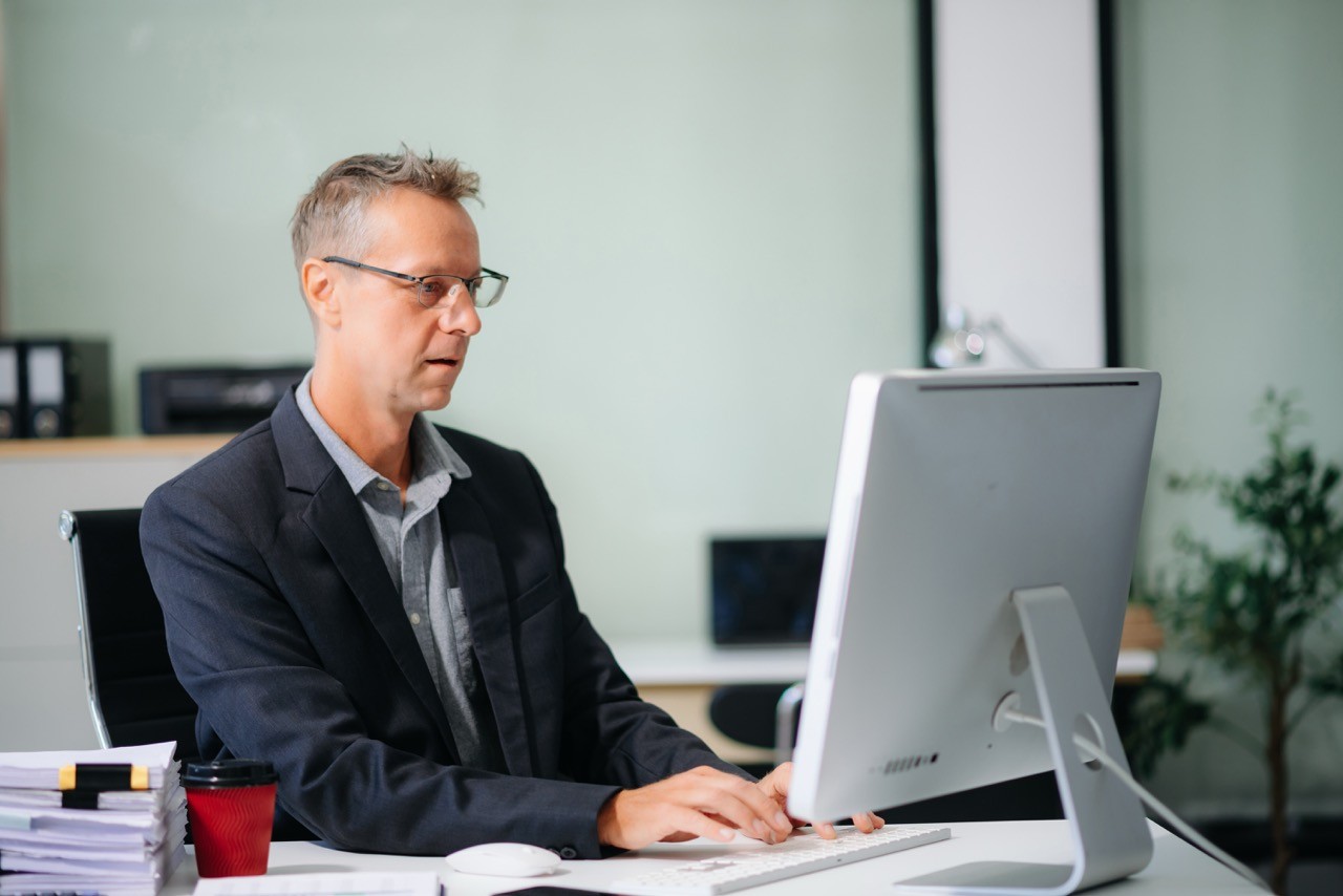 Man sitting at computer in an office