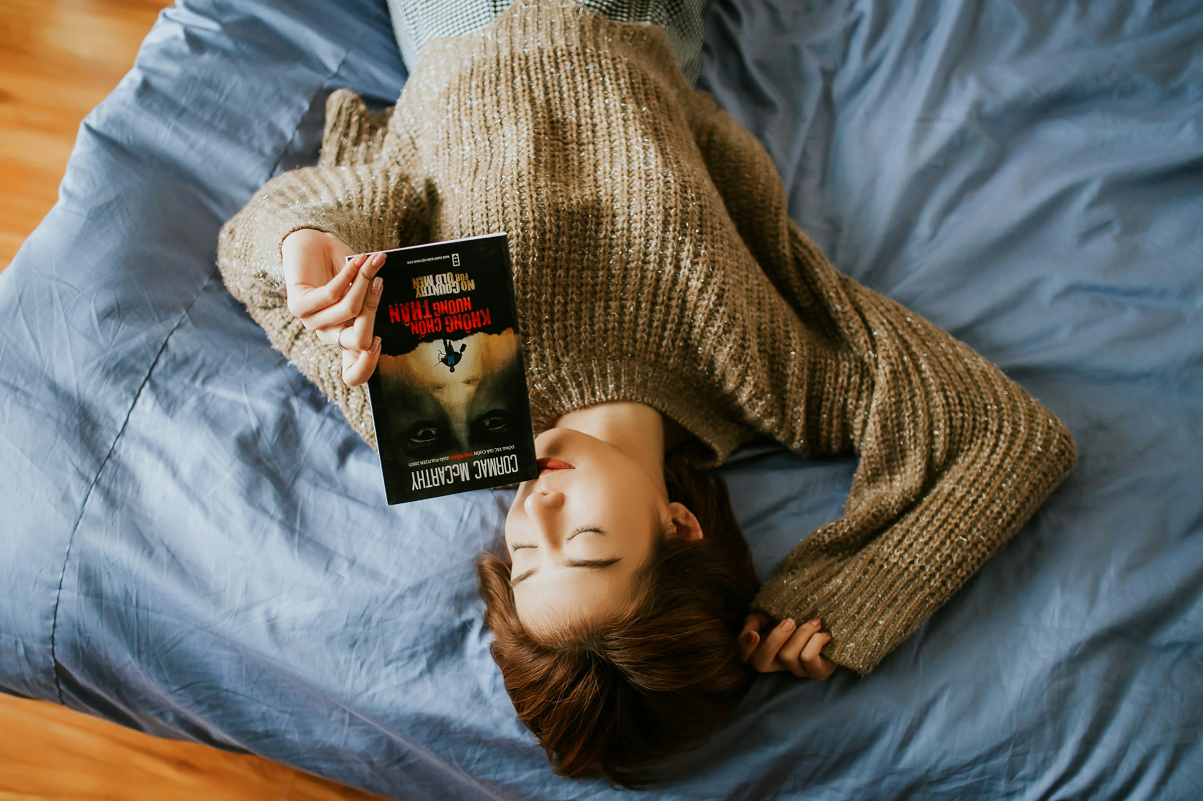 woman reading a book - Morning Routine Checklist