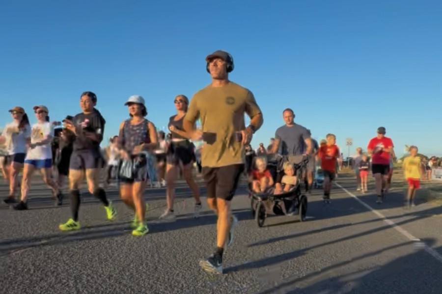 Photo of people running