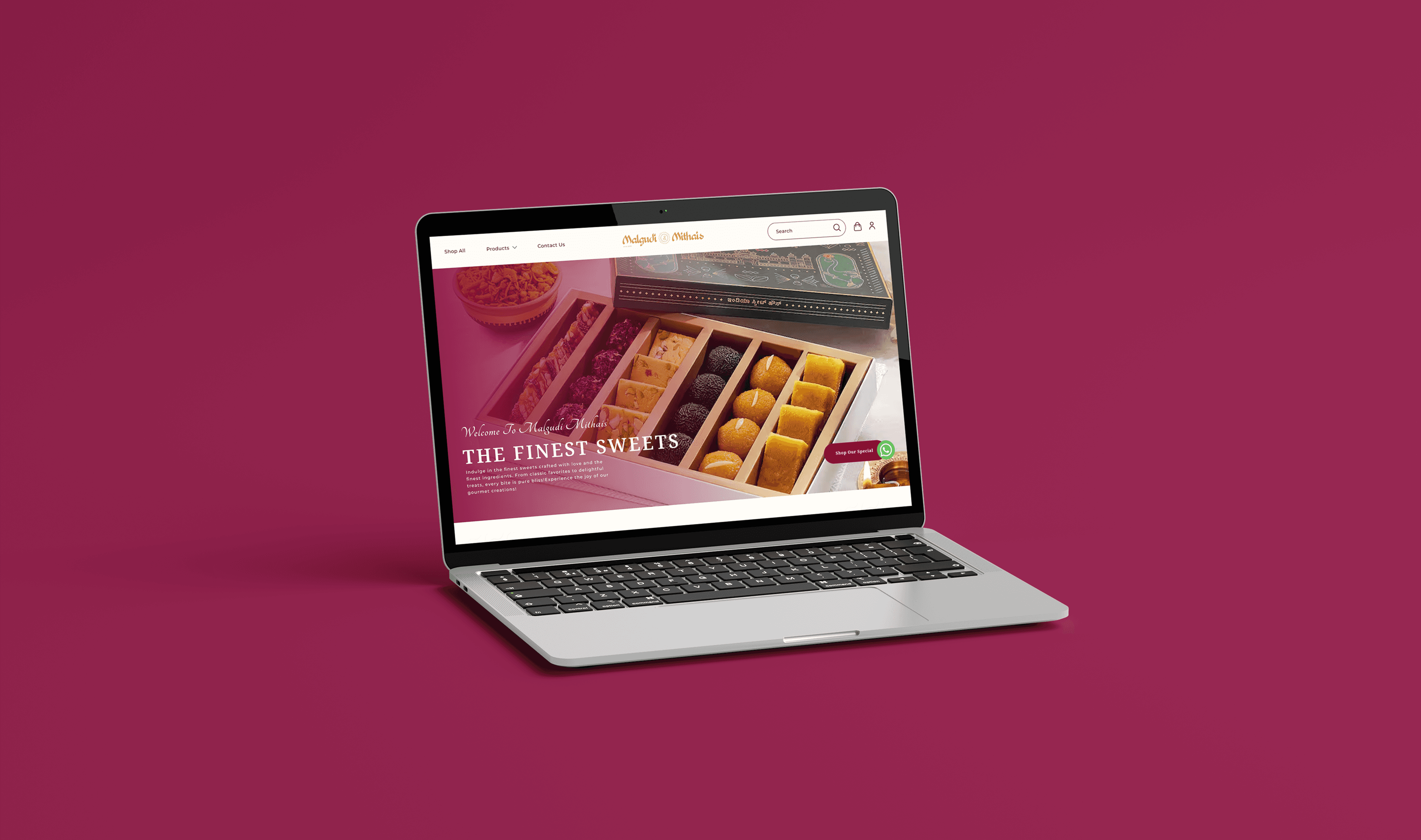 Website mockup of Malgudi Mithai online sweet shop displayed on a laptop screen with premium Indian sweets and traditional snacks showcased on the homepage.