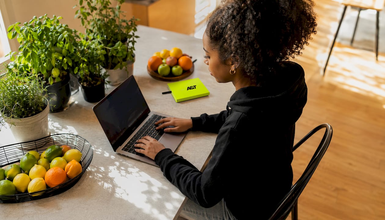 Data scientist working on ad analytics laptop