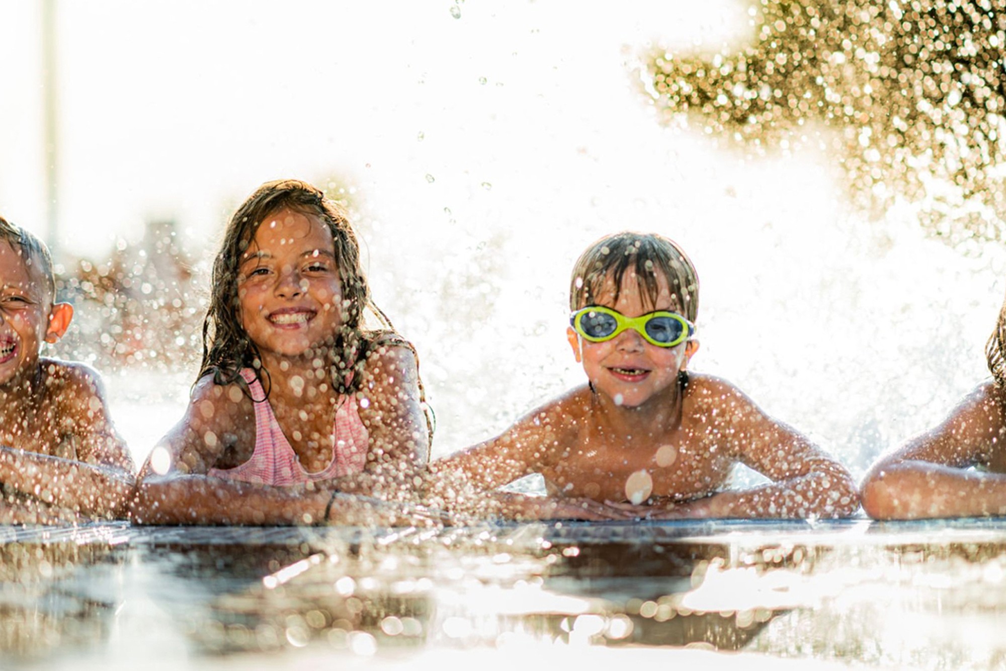 Children in a swimming lesson representing a local swim school website designed to drive enquiries and bookings