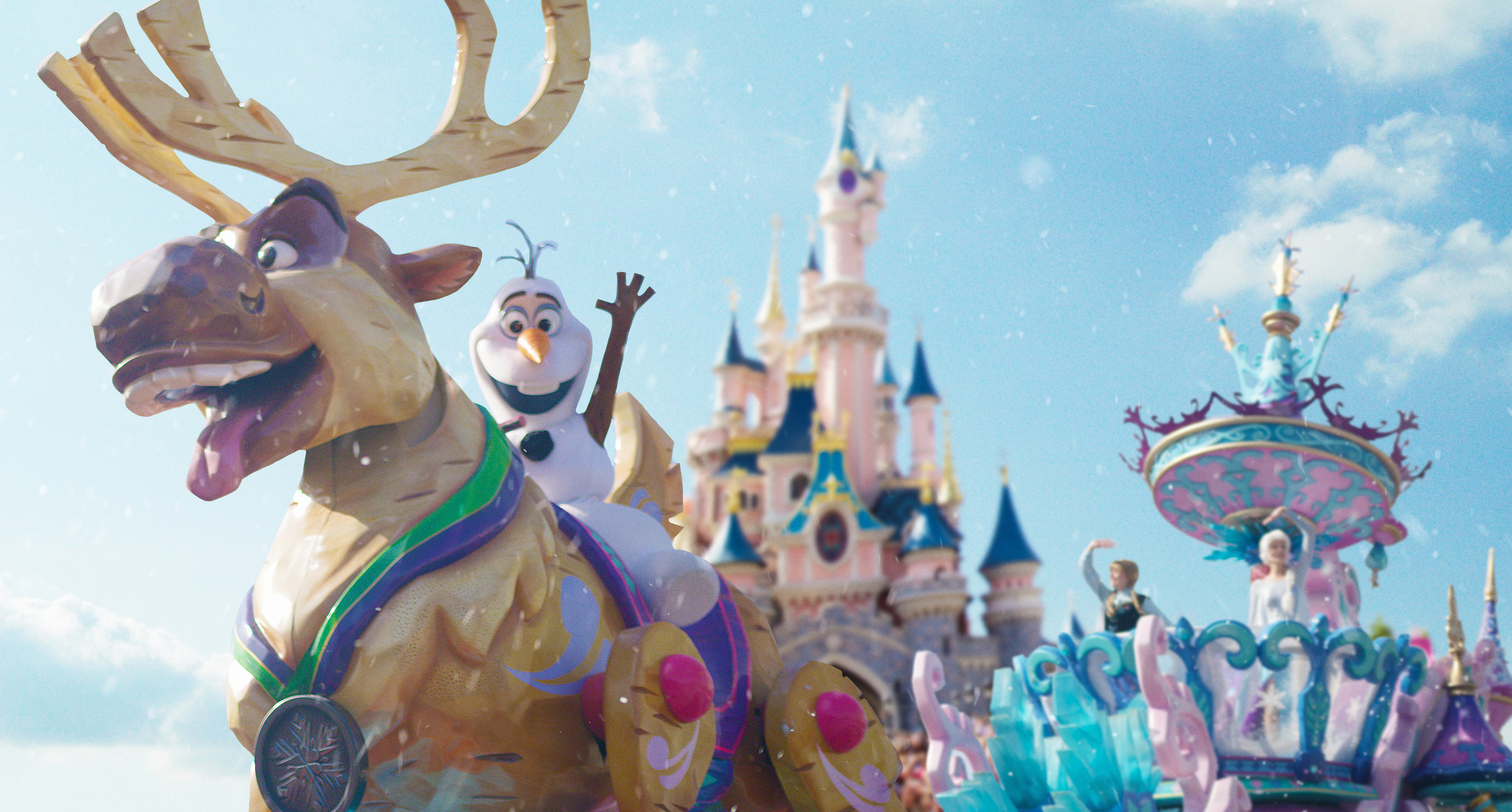 a group of toy figurines standing around a christmas tree