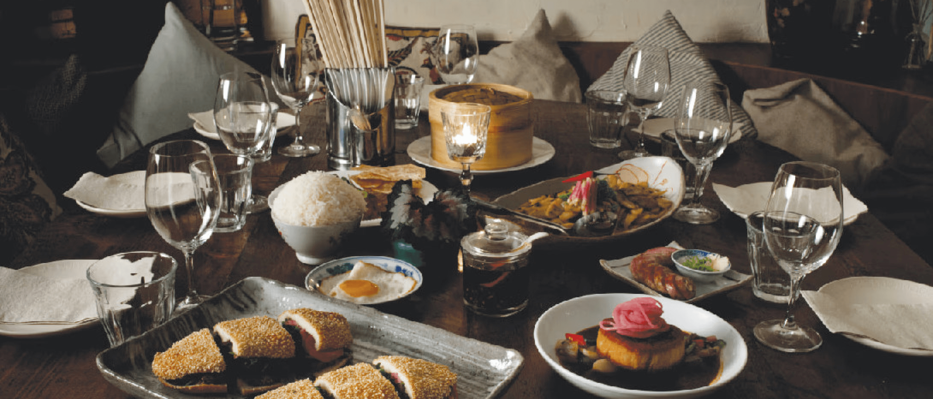 Photo of a Table of Asian food and drink