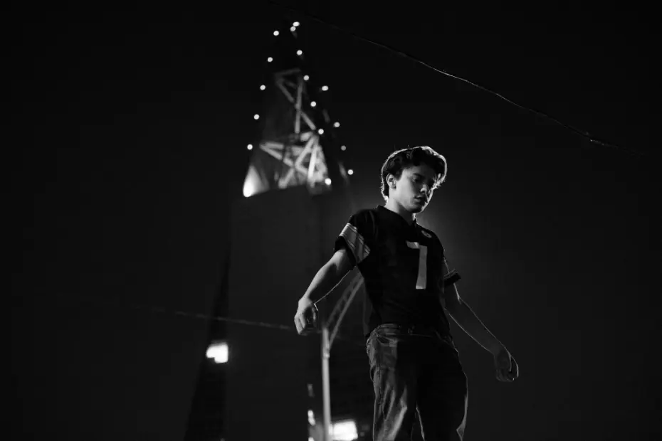 a man holding a cocktail