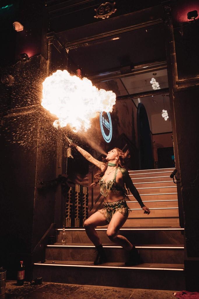 Woman fire breather in El Santo