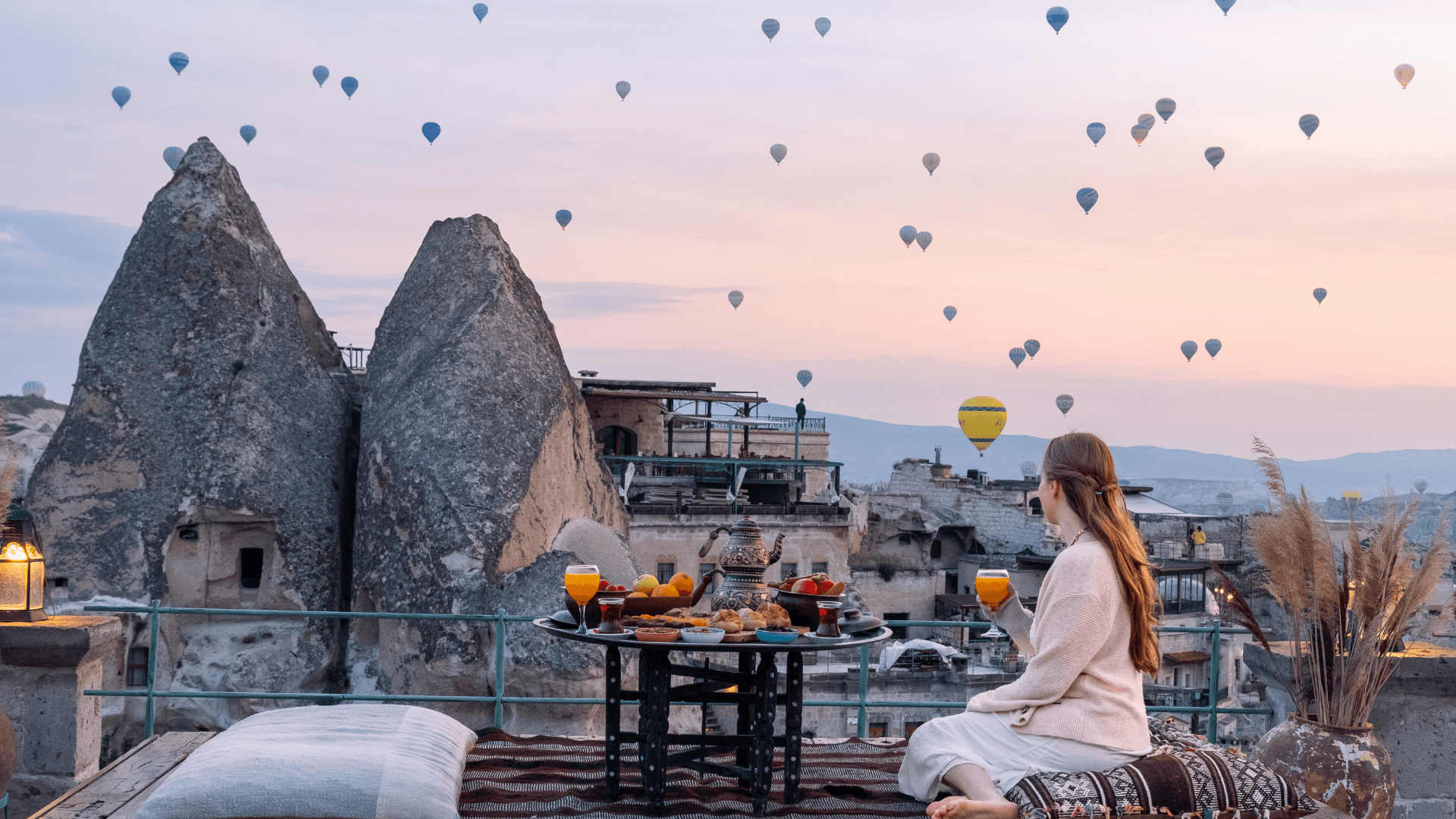 Cappadocia sunrise breakfast with hot air balloons and fairy chimneys, Türkiye